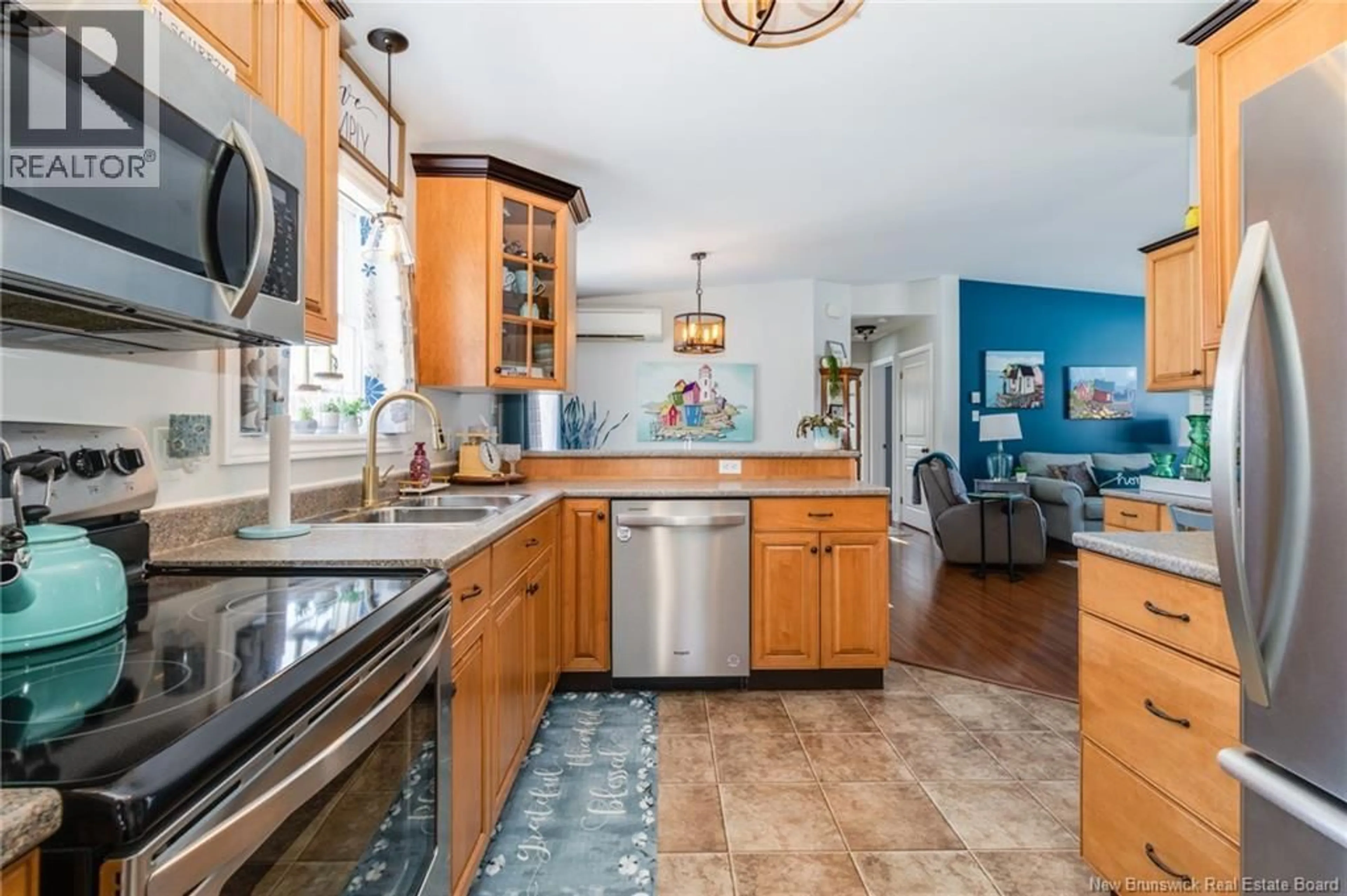 Open concept kitchen, ceramic/tile floor for 40 BRETT JONATHON DRIVE, Rusagonis New Brunswick E3B0S4