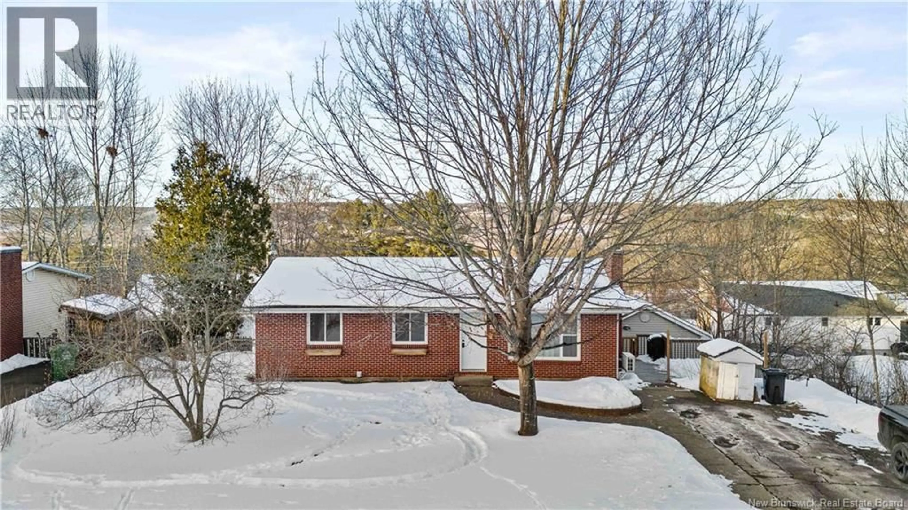 A pic from outside/outdoor area/front of a property/back of a property/a pic from drone, street for 19 BIRCHCROFT DRIVE, Silverwood New Brunswick E3C1K7