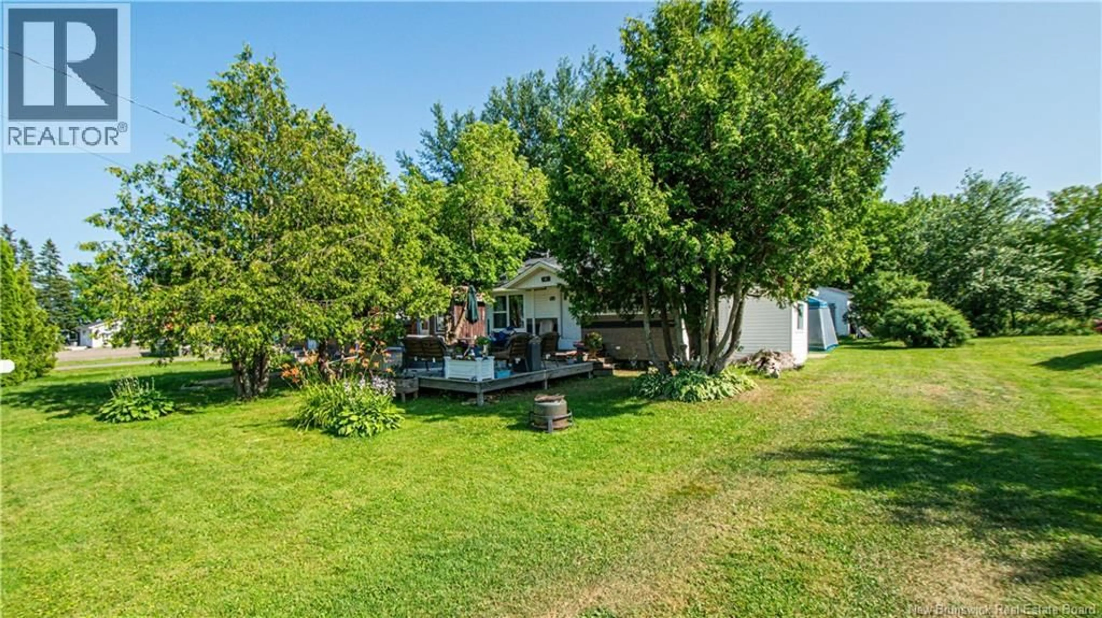 A pic from outside/outdoor area/front of a property/back of a property/a pic from drone, unknown for 52 BRAY BOULEVARD, Cocagne New Brunswick E4R2G4