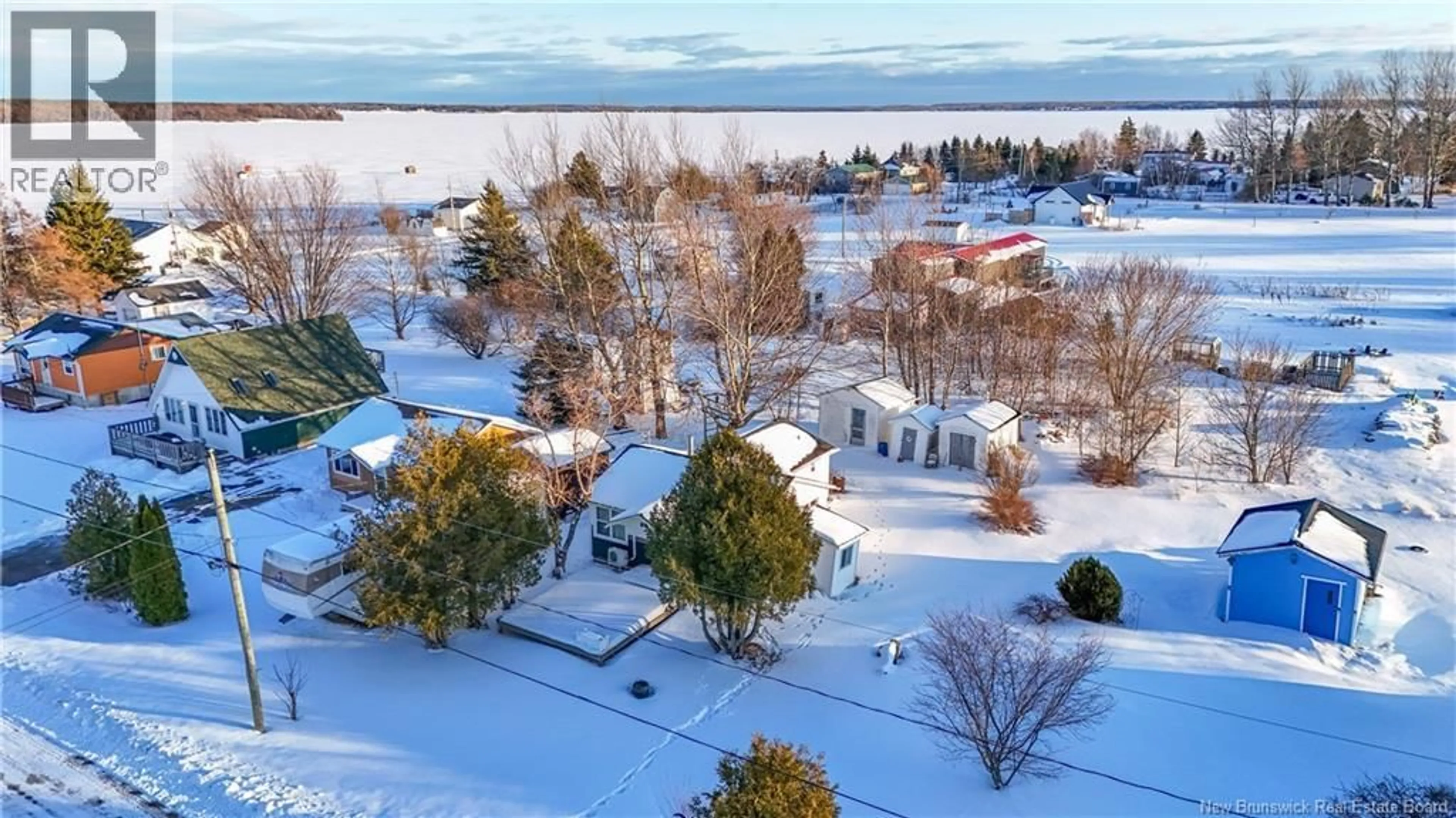 A pic from outside/outdoor area/front of a property/back of a property/a pic from drone, water/lake/river/ocean view for 52 BRAY BOULEVARD, Cocagne New Brunswick E4R2G4