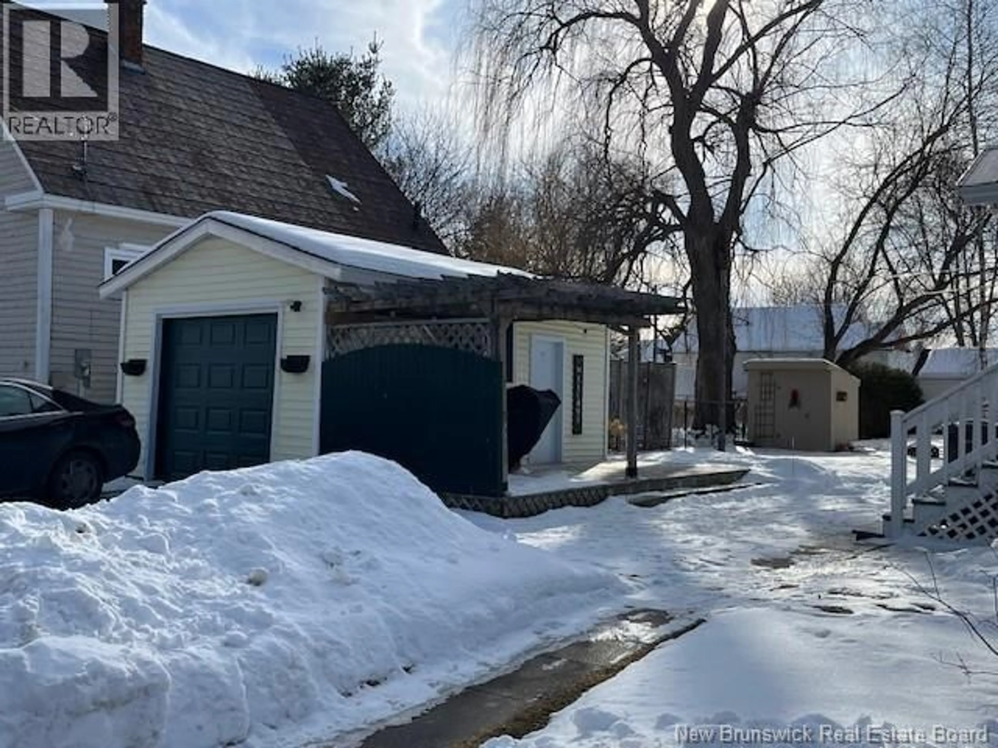 A pic from outside/outdoor area/front of a property/back of a property/a pic from drone, street for 168 HENRY STREET, Fredericton New Brunswick E3A3J3