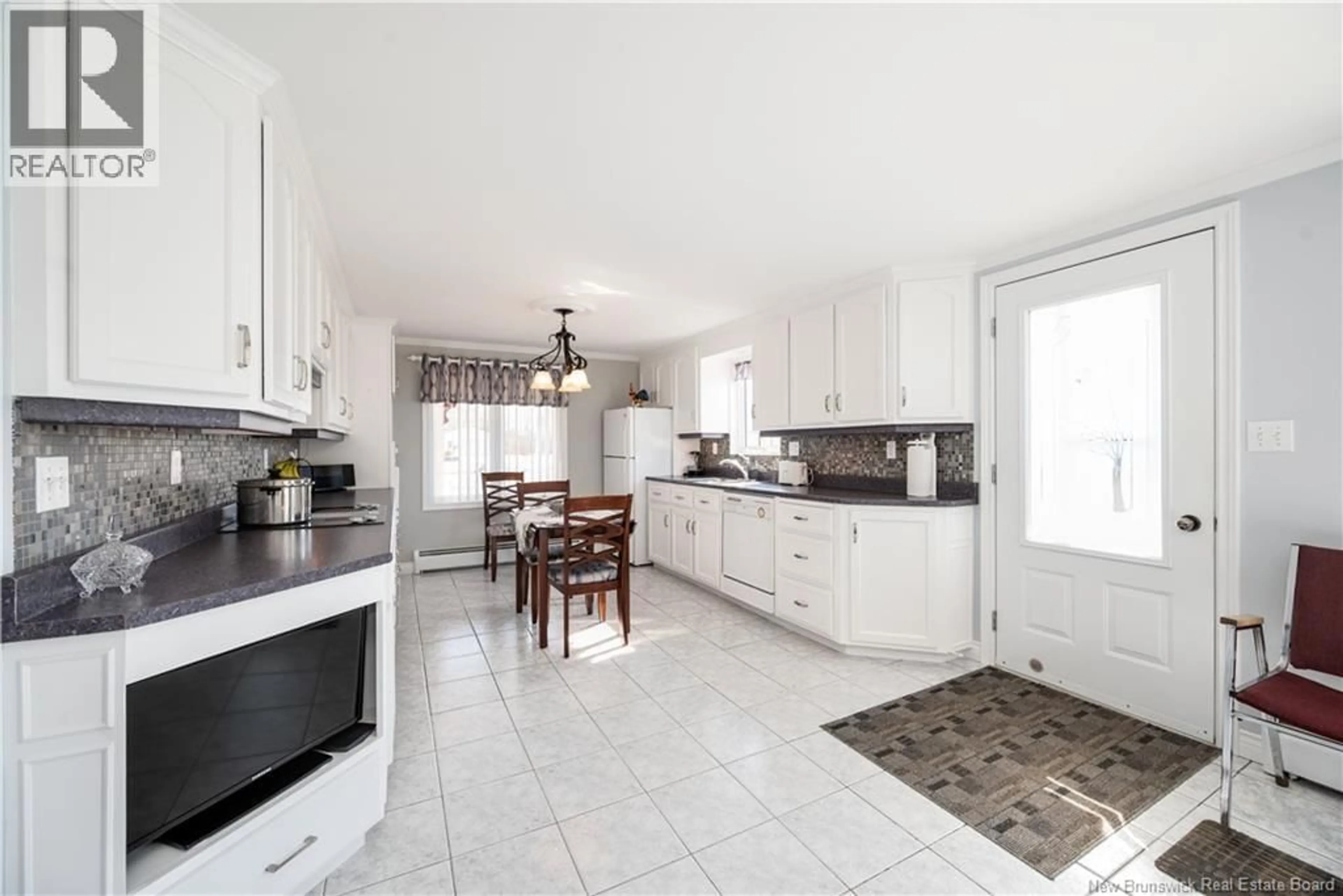 Open concept kitchen, ceramic/tile floor for 917 ROUTE 933, Haute-Aboujagane New Brunswick E4P5R1