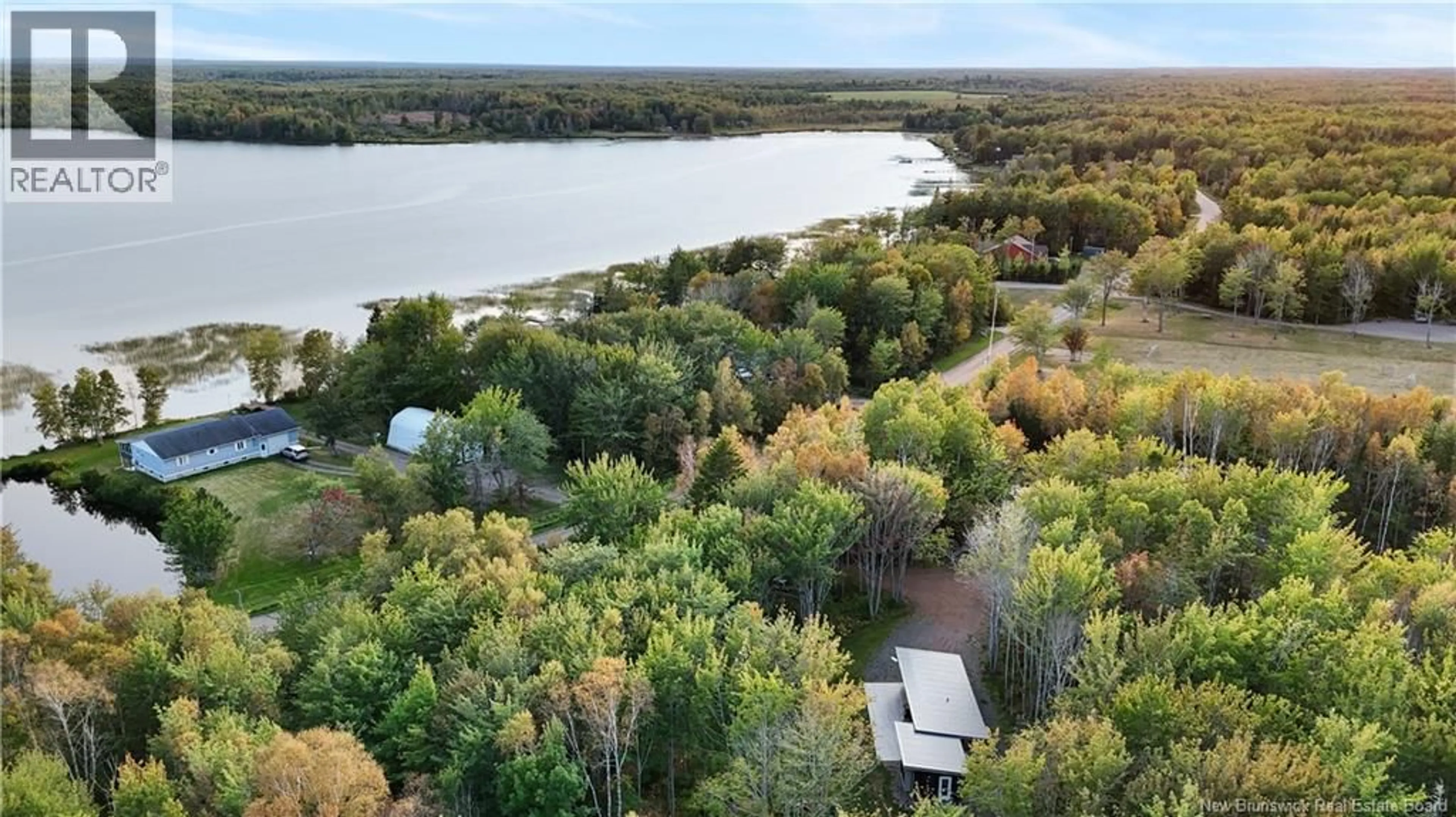 A pic from outside/outdoor area/front of a property/back of a property/a pic from drone, water/lake/river/ocean view for 485 SQUARE LAKE ROAD, Beaubassin East New Brunswick E4P6G7