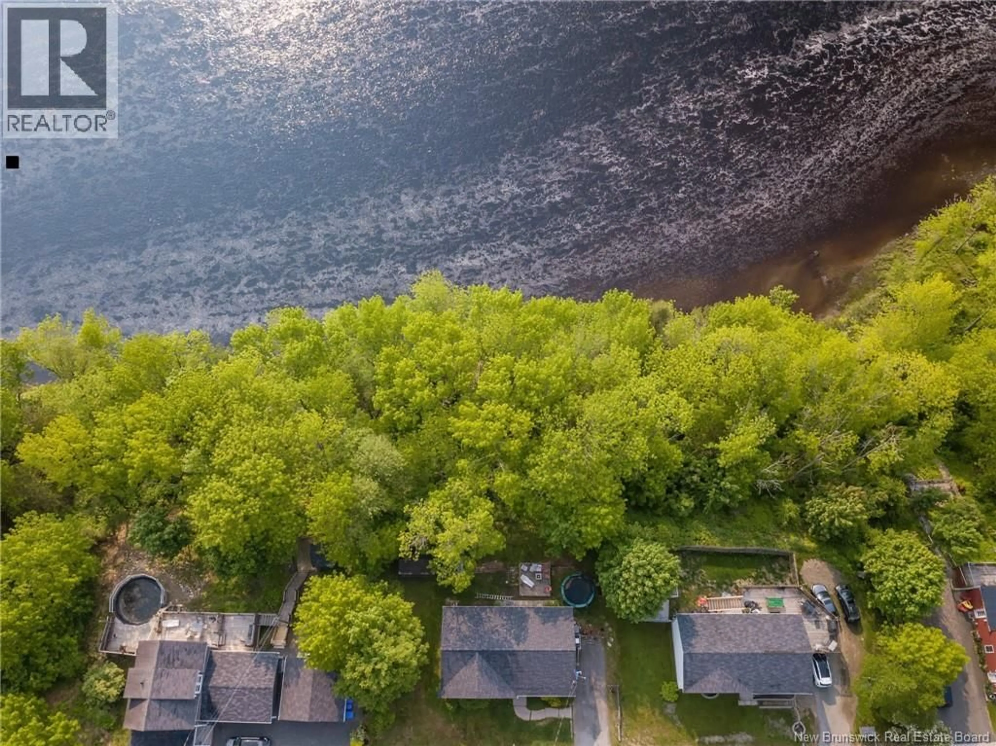 A pic from outside/outdoor area/front of a property/back of a property/a pic from drone, water/lake/river/ocean view for 316 MILLTOWN BOULEVARD, St. Stephen New Brunswick E3L1H9