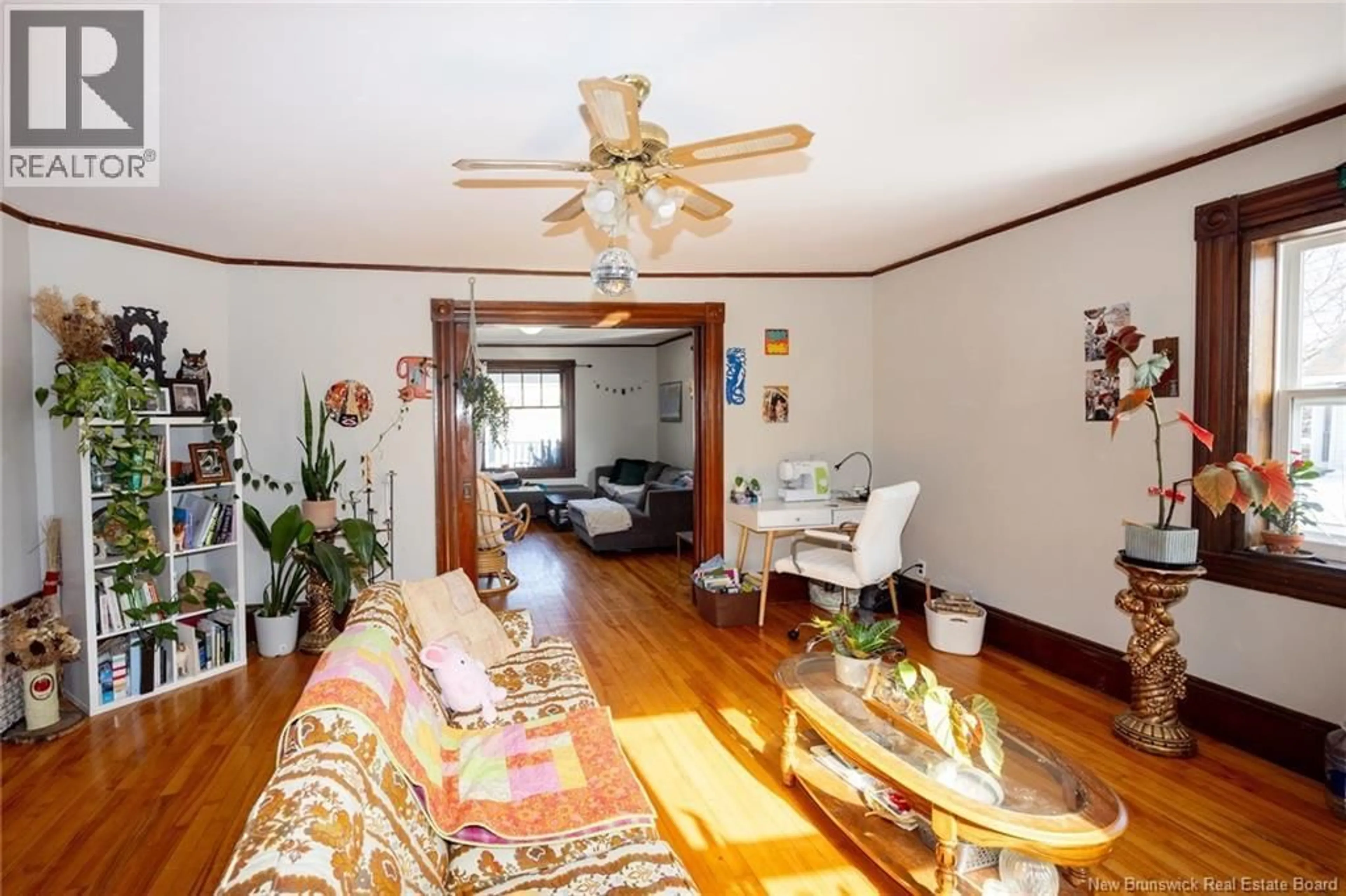 Living room with furniture, wood/laminate floor for 352-354 GEORGE STREET, Fredericton New Brunswick E3B1J7