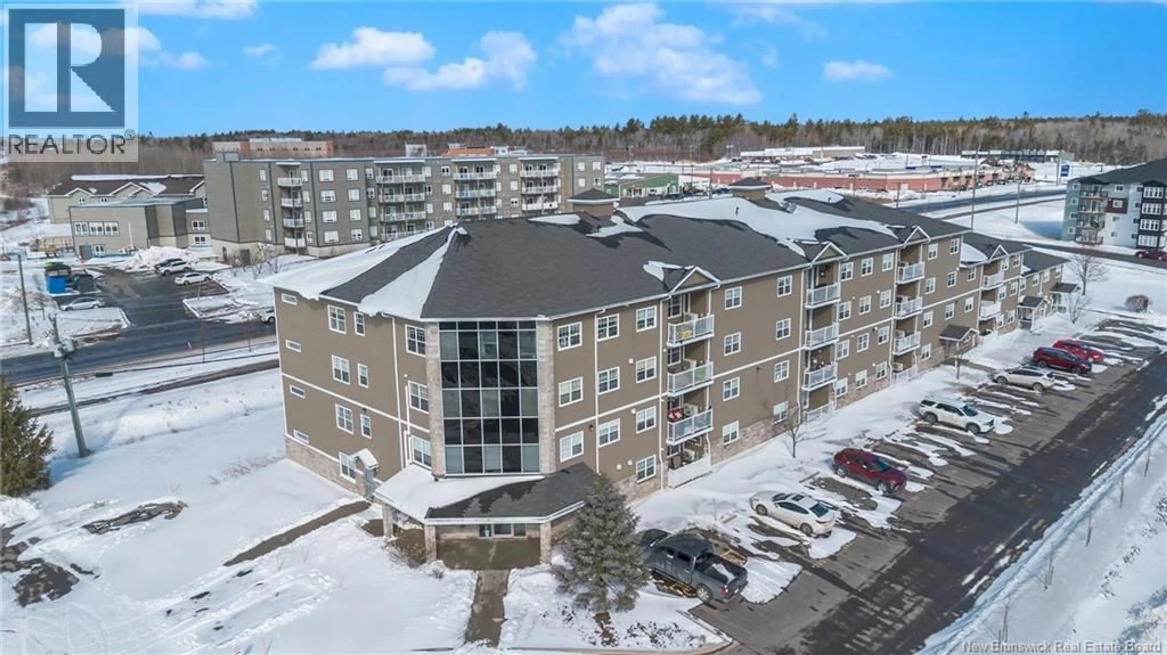 A pic from outside/outdoor area/front of a property/back of a property/a pic from drone, building for 107 - 700 CLIFFE, Fredericton New Brunswick E3A5V2
