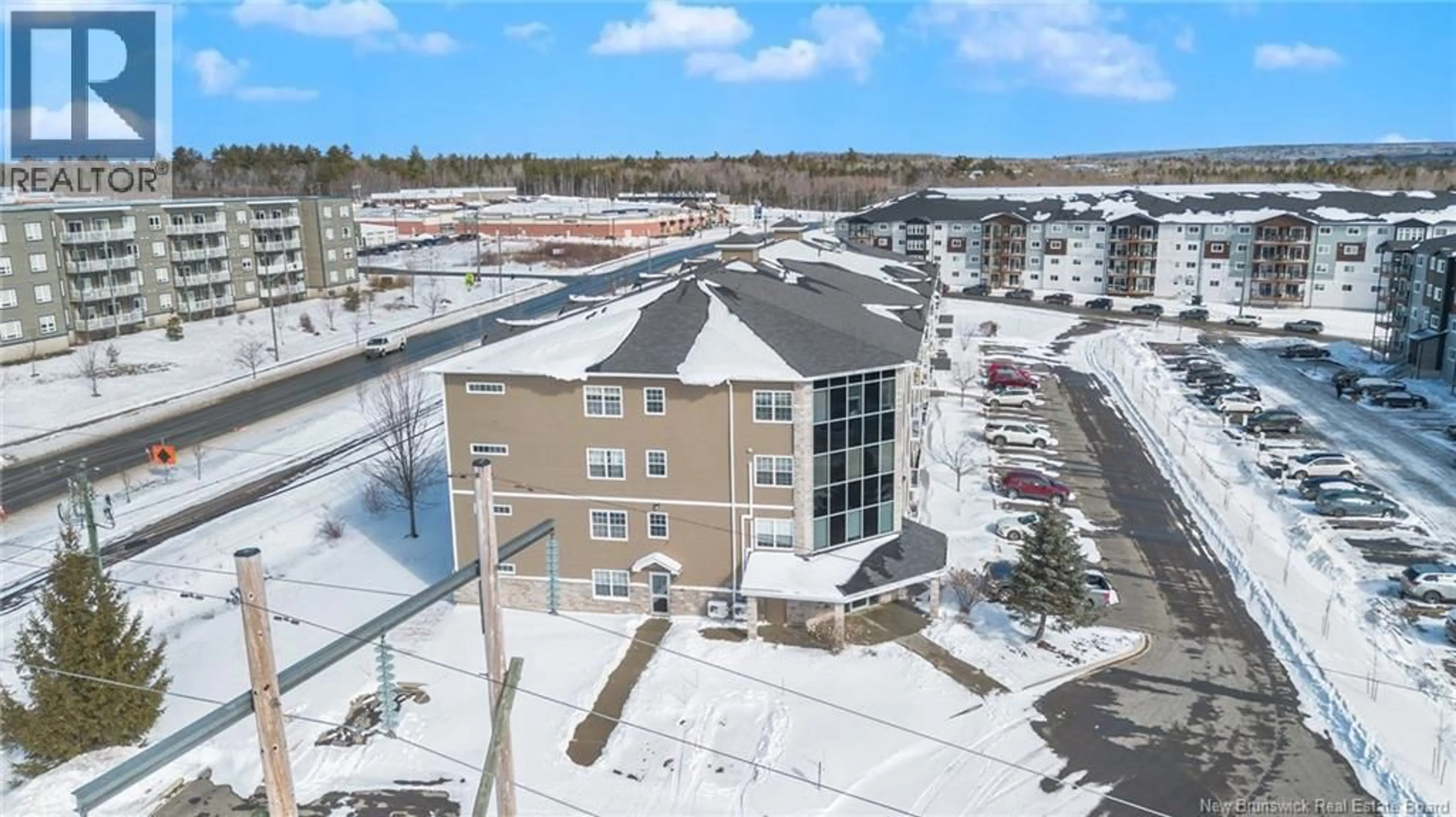 A pic from outside/outdoor area/front of a property/back of a property/a pic from drone, building for 107 - 700 CLIFFE, Fredericton New Brunswick E3A5V2