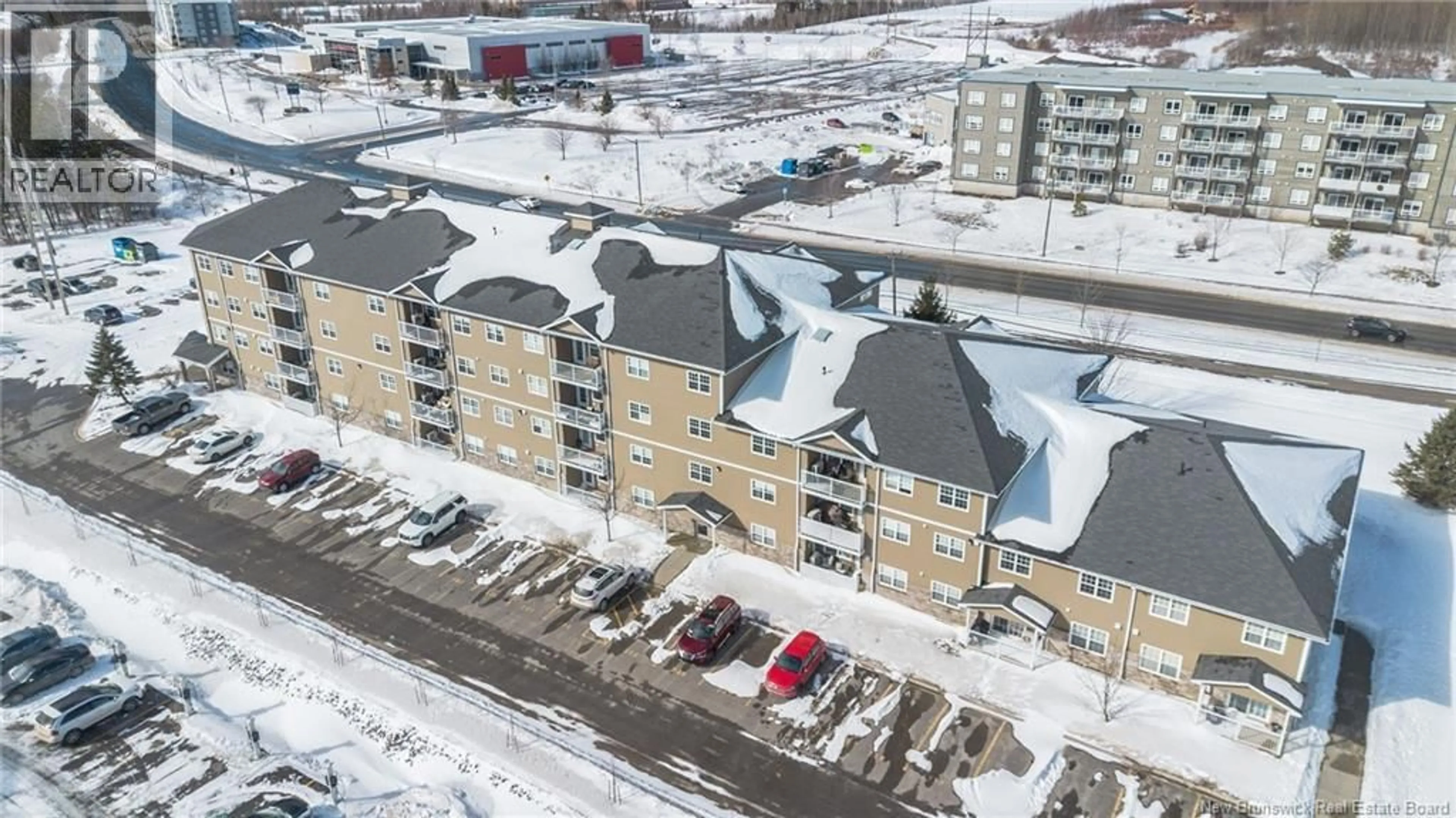 A pic from outside/outdoor area/front of a property/back of a property/a pic from drone, building for 107 - 700 CLIFFE, Fredericton New Brunswick E3A5V2