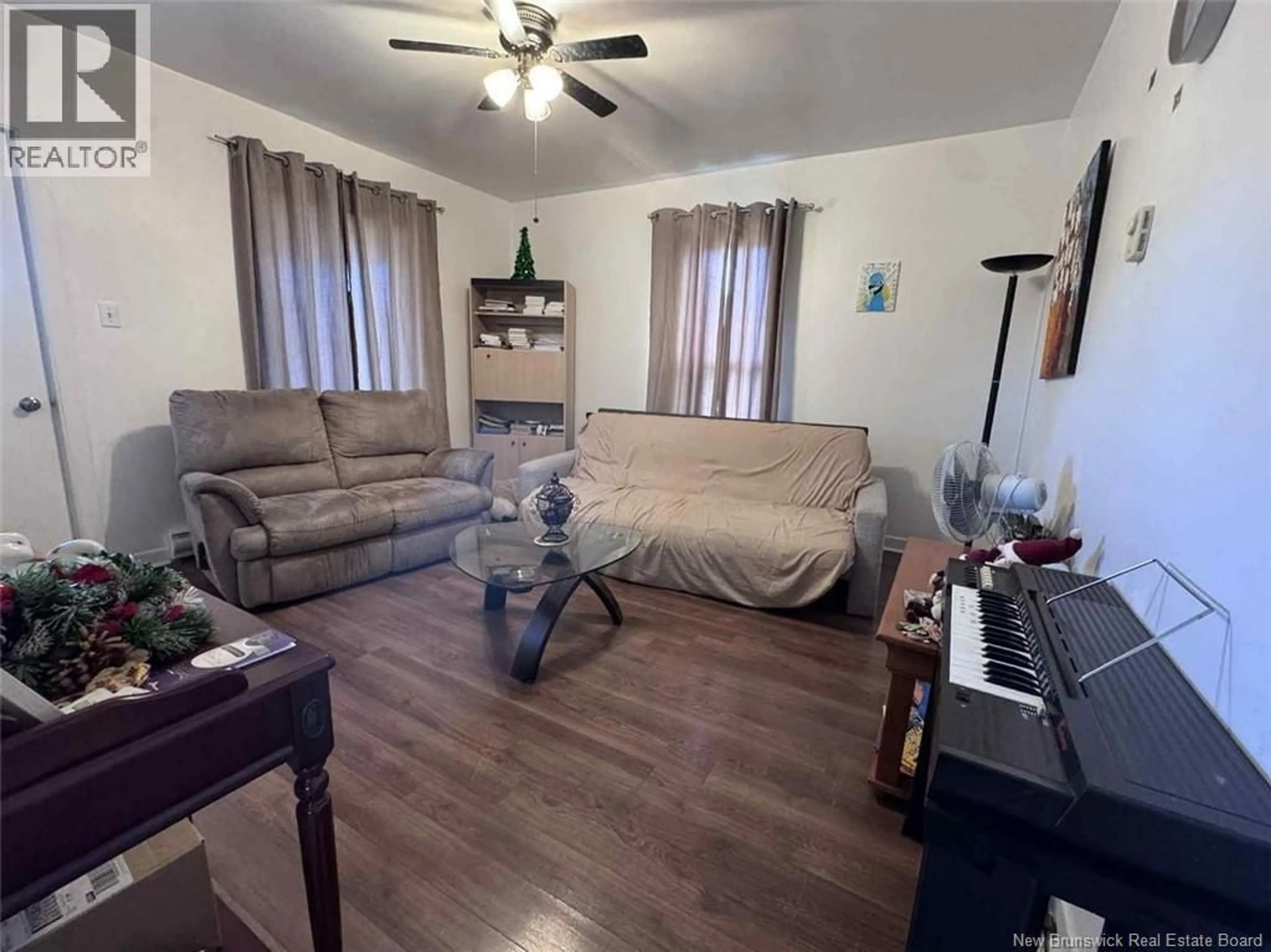 Living room with furniture, unknown for 9 MARTIN STREET, Edmundston New Brunswick E3V2L8