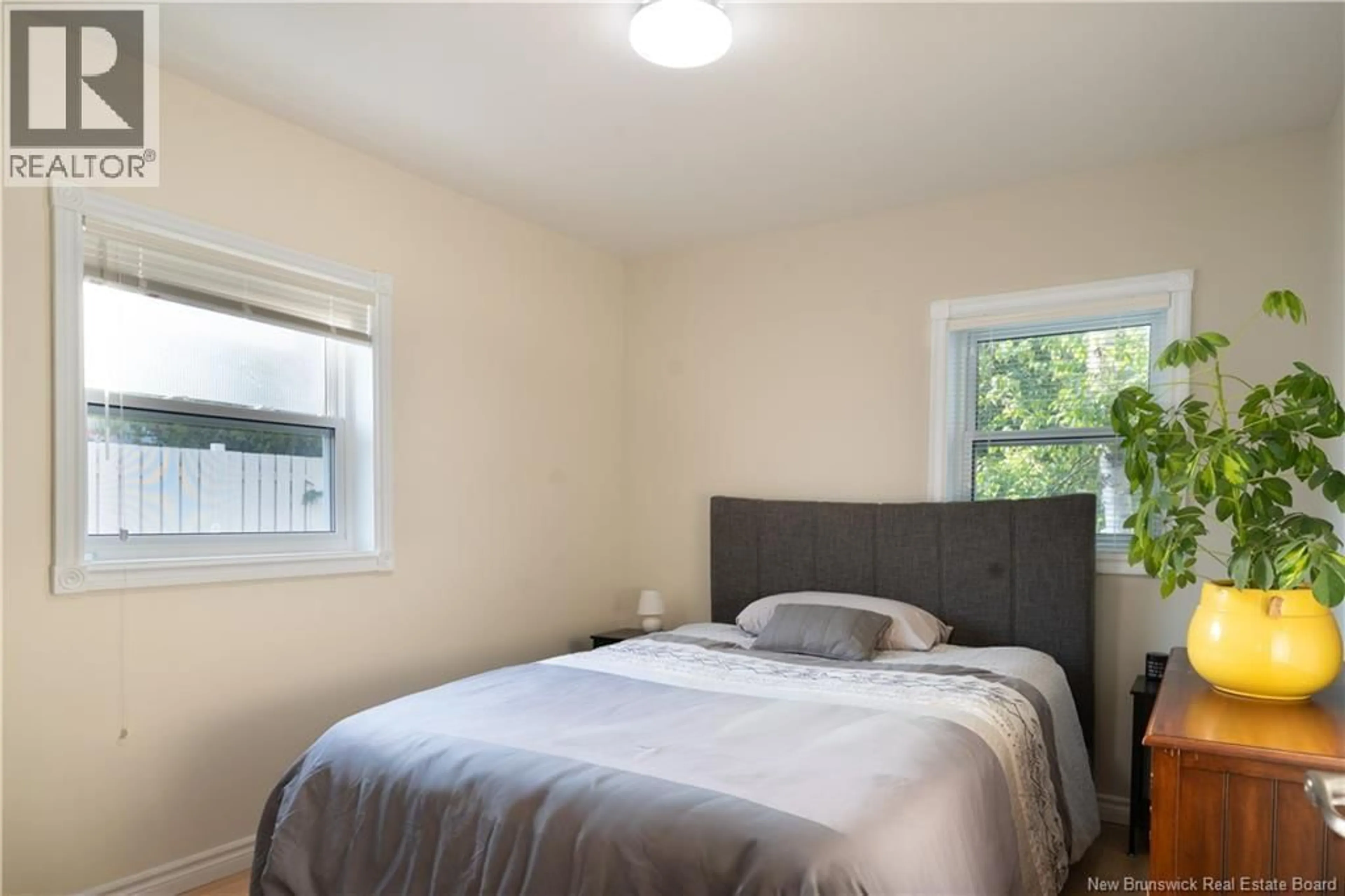Bedroom with bed, wood/laminate floor for 172 D'ASTOUS STREET, Dalhousie New Brunswick E8E1M2