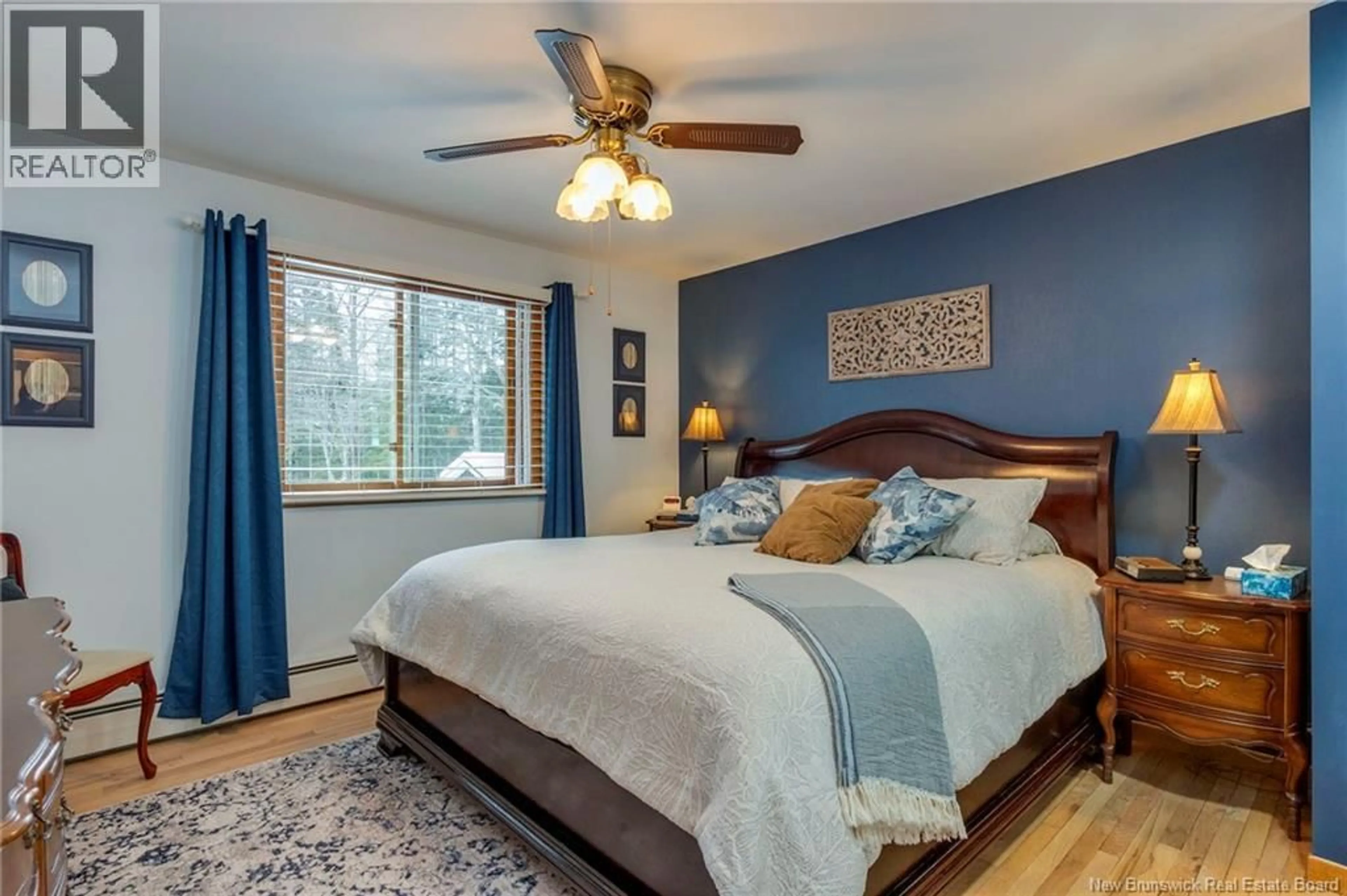 Bedroom with bed, wood/laminate floor for 3020 LOCH LOMOND ROAD, Saint John New Brunswick E2N1B1