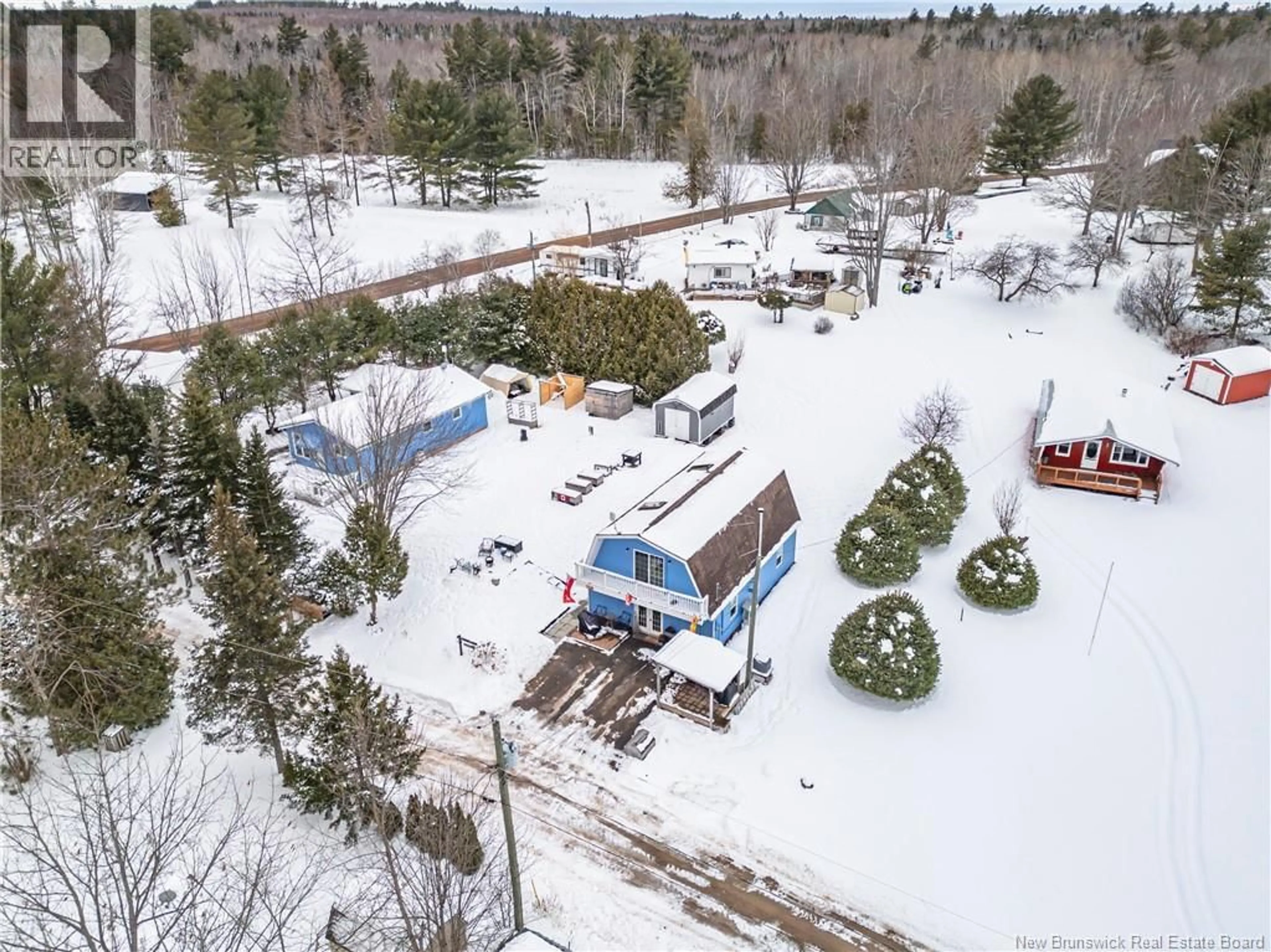 A pic from outside/outdoor area/front of a property/back of a property/a pic from drone, street for 156 MEADOW LANE, Jemseg New Brunswick E3C3Z3
