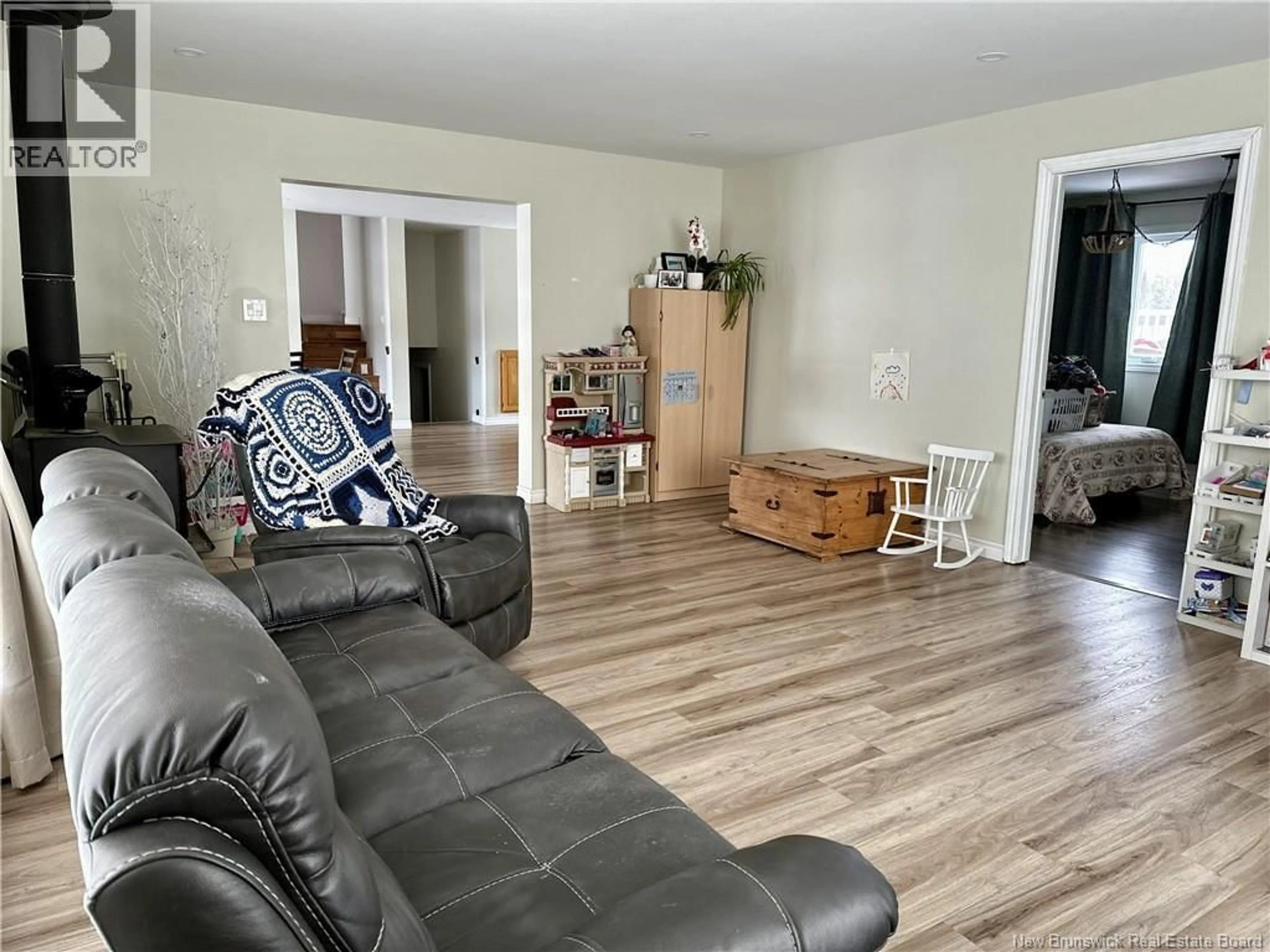 Living room with furniture, wood/laminate floor for 45 L'ANSE STREET, Eel River Crossing New Brunswick E8E1P9