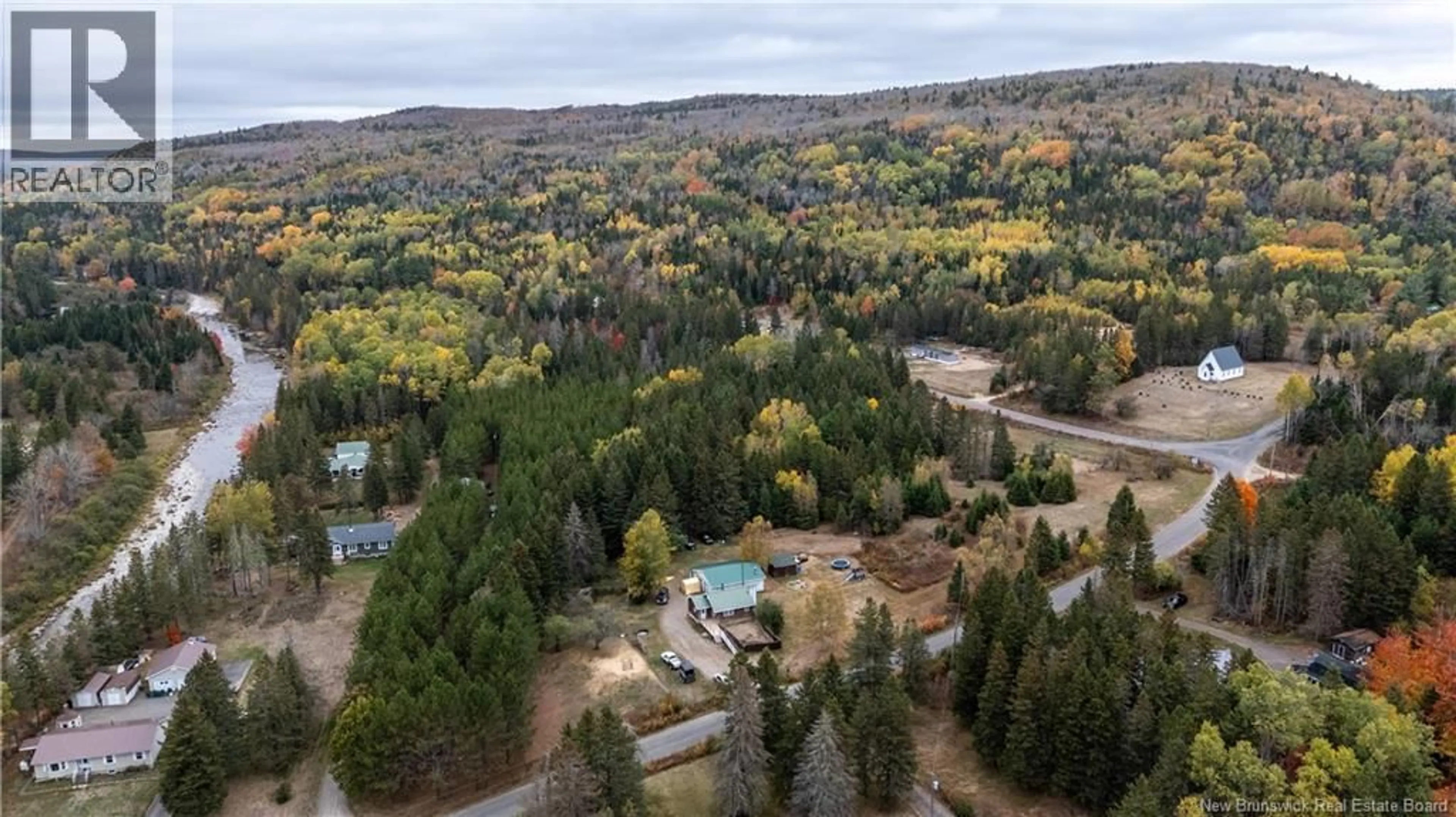 A pic from outside/outdoor area/front of a property/back of a property/a pic from drone, forest/trees view for 18 CHURCH HILL ROAD, Elgin New Brunswick E4Z6H2