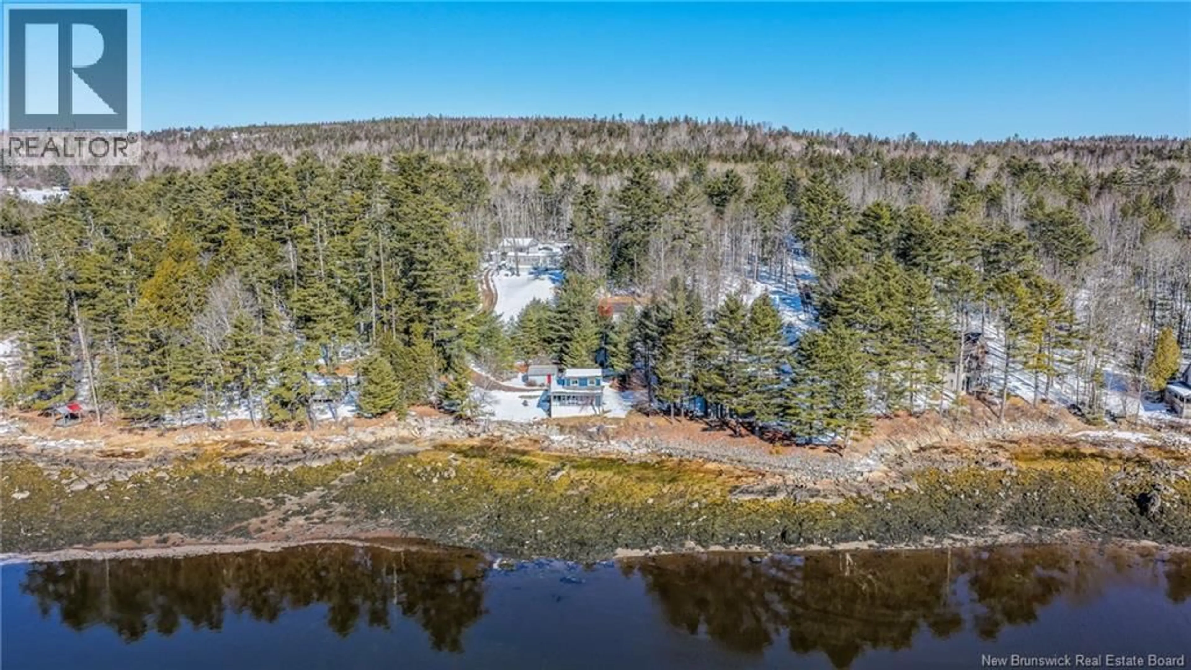 A pic from outside/outdoor area/front of a property/back of a property/a pic from drone, water/lake/river/ocean view for 12 BAYVIEW DRIVE, Dufferin New Brunswick E3L3R9