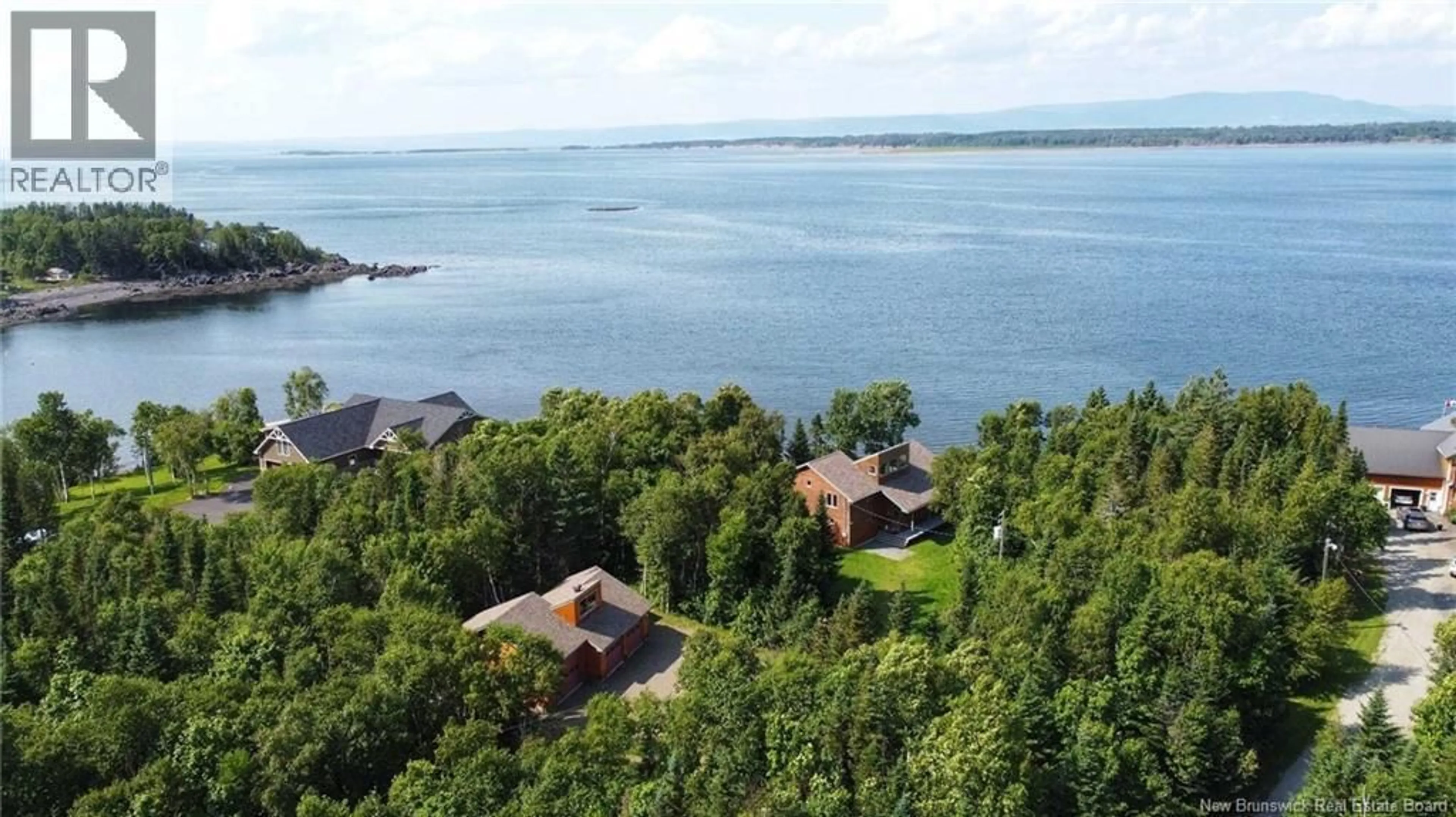 A pic from outside/outdoor area/front of a property/back of a property/a pic from drone, water/lake/river/ocean view for 25 ISLAND VIEW, Sea Side New Brunswick E8G0A7