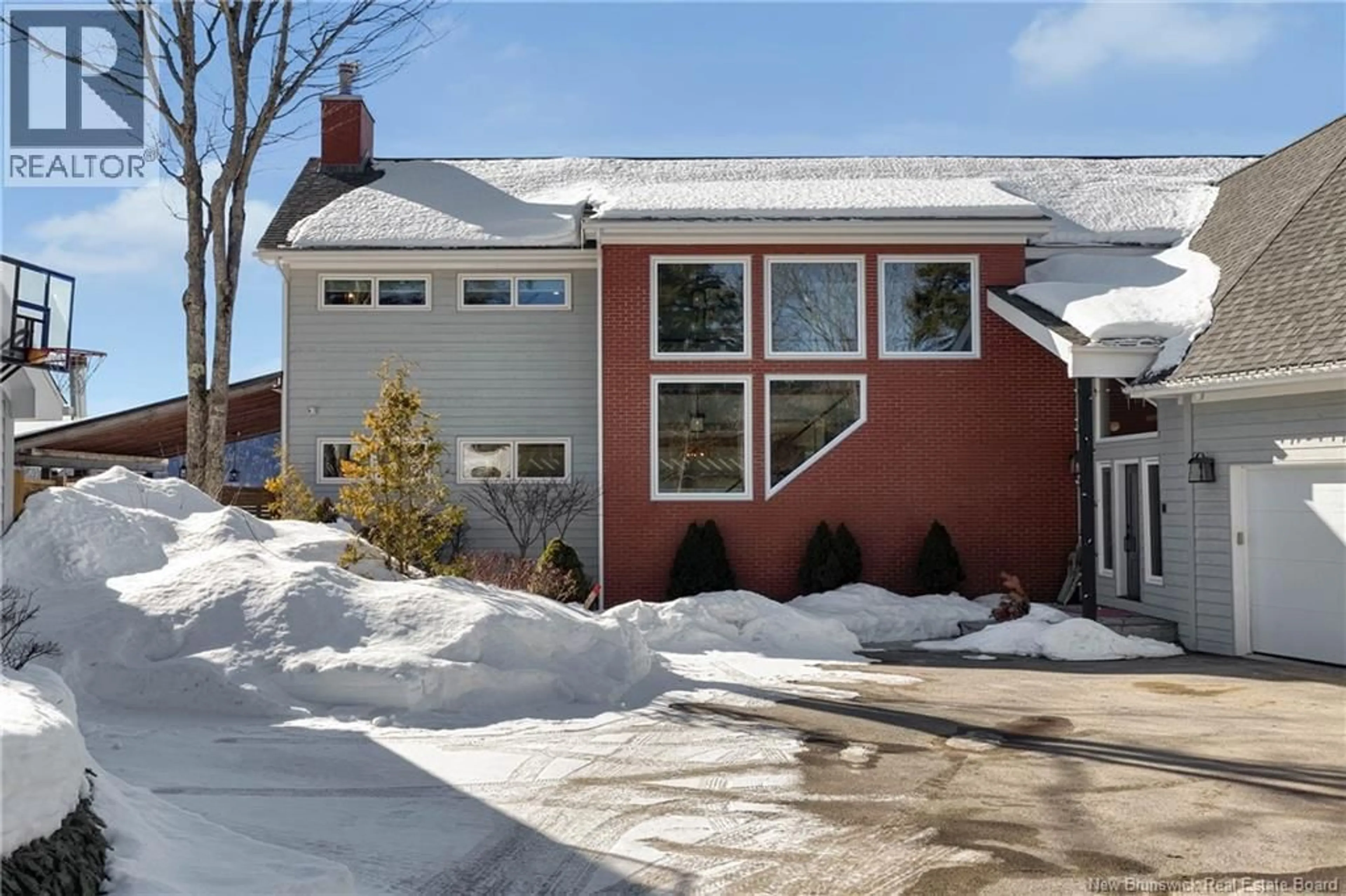 Home with brick exterior material, street for 57 MALISEET DRIVE, Rothesay New Brunswick E2E2G1