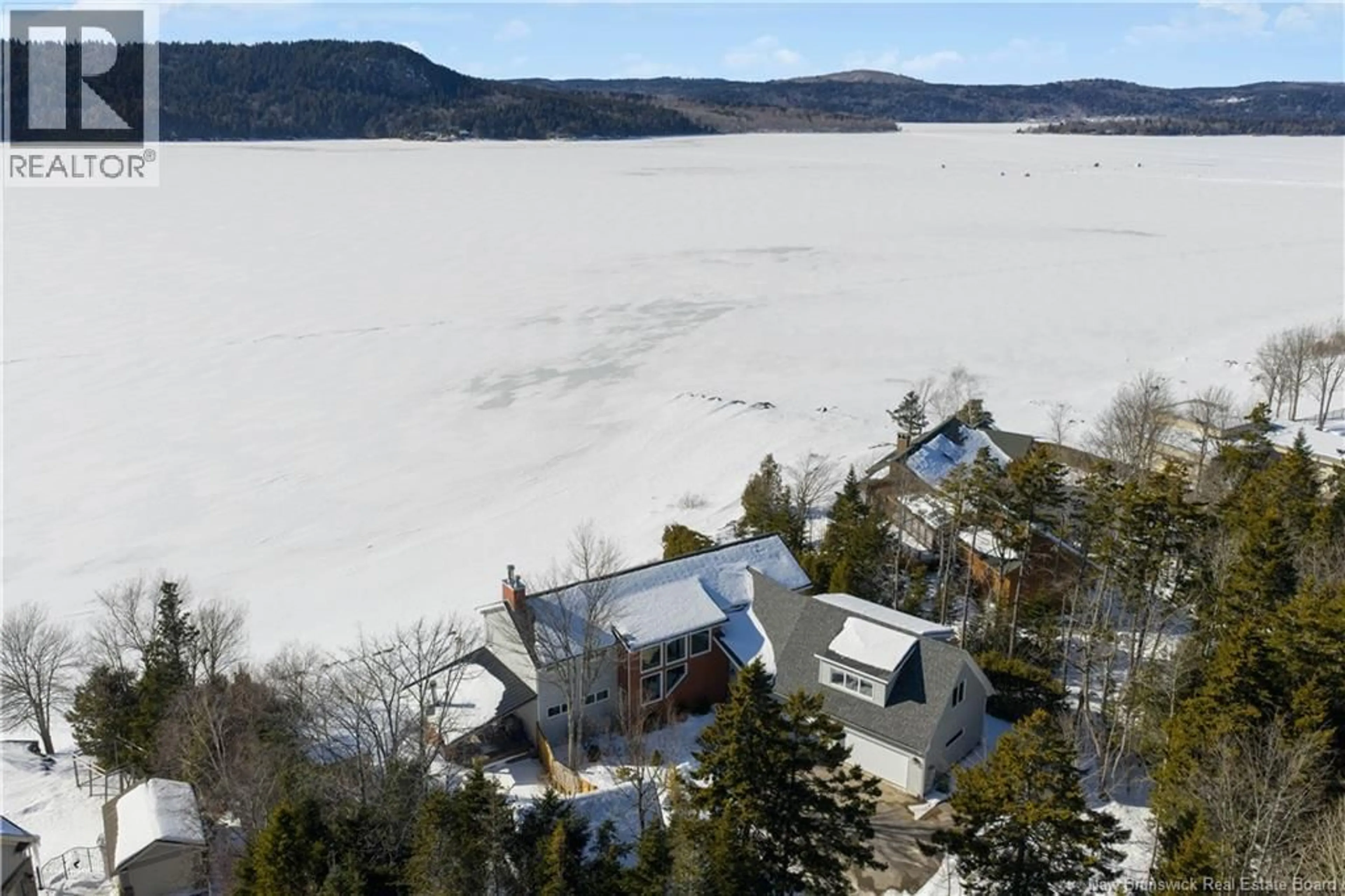 A pic from outside/outdoor area/front of a property/back of a property/a pic from drone, water/lake/river/ocean view for 57 MALISEET DRIVE, Rothesay New Brunswick E2E2G1