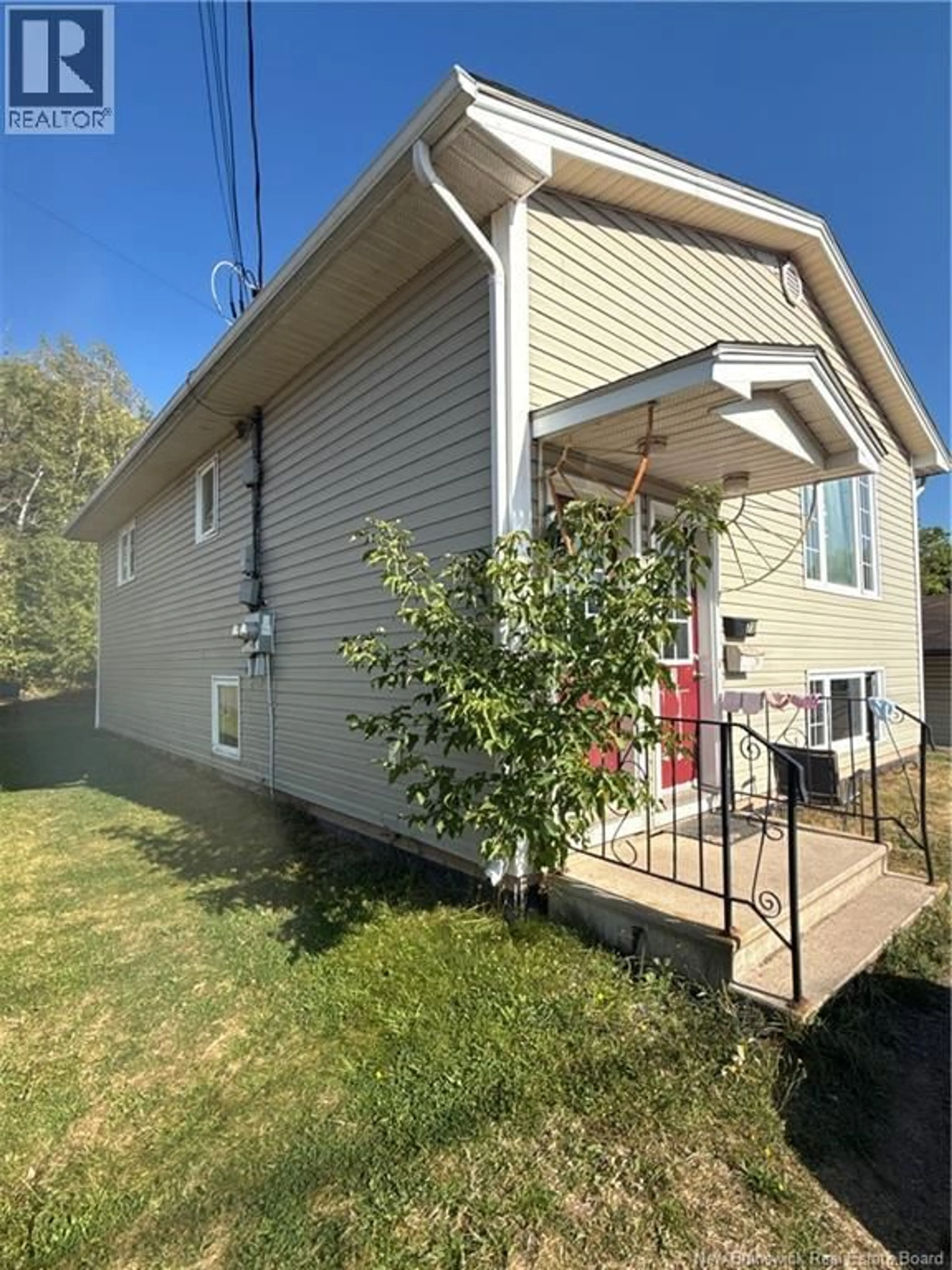 Home with vinyl exterior material, street for 71-73 MILL ROAD, Moncton New Brunswick E1A4A4