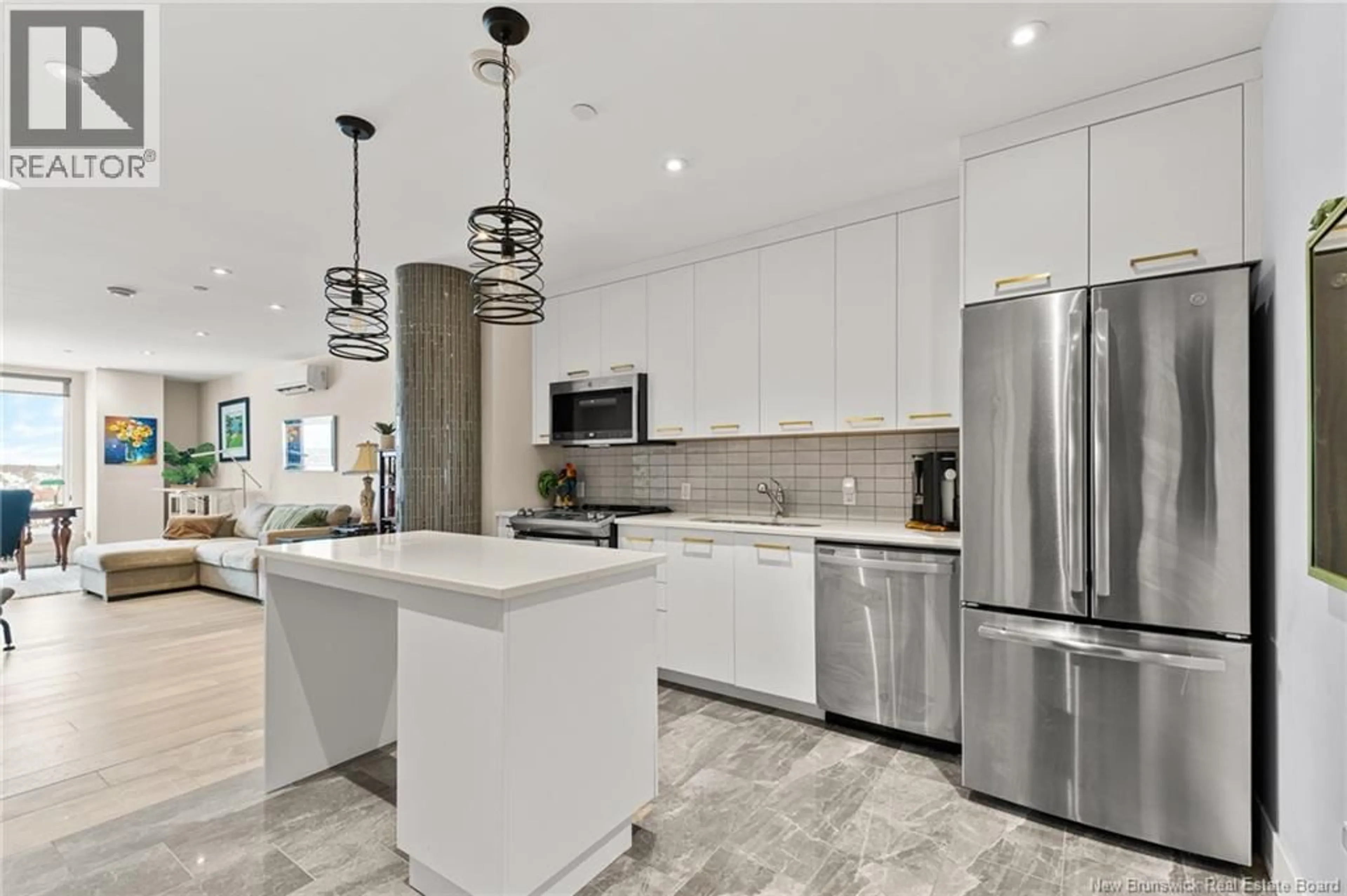 Open concept kitchen, ceramic/tile floor for 702 - 55 QUEEN STREET, Moncton New Brunswick E1C1K2