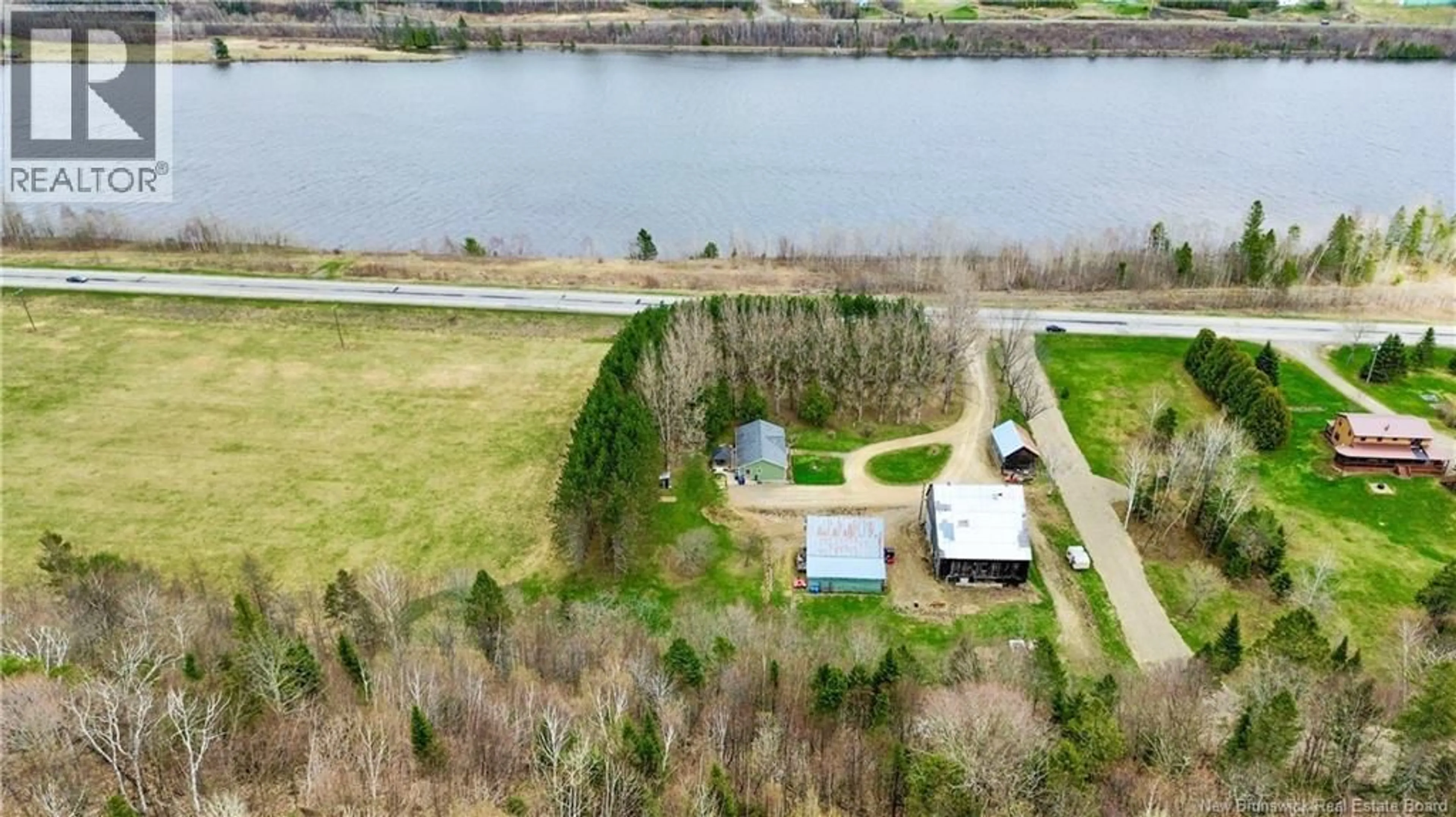A pic from outside/outdoor area/front of a property/back of a property/a pic from drone, water/lake/river/ocean view for 6659 130 ROUTE, Clearview New Brunswick E7L1Y2