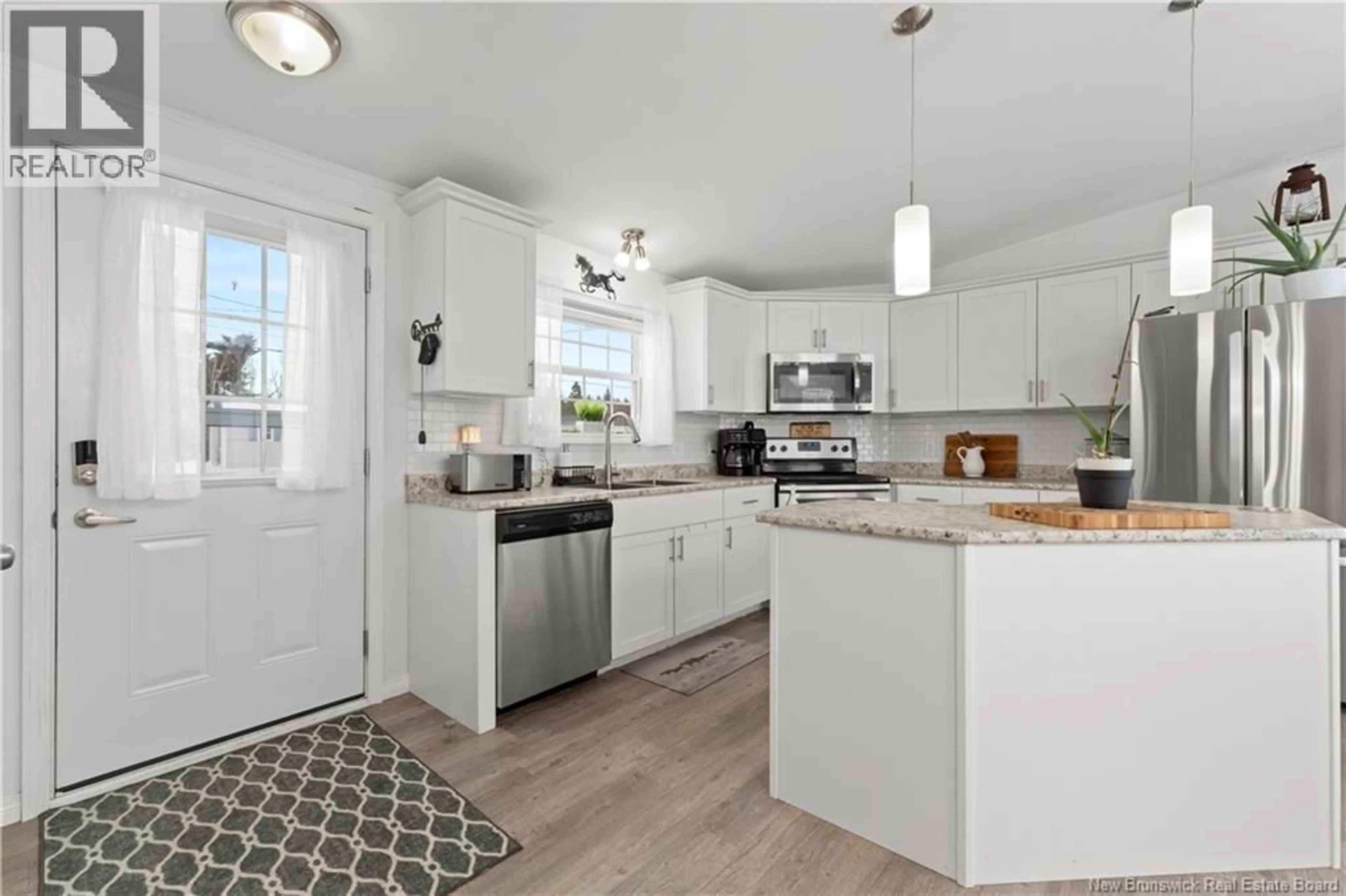 Open concept kitchen, ceramic/tile floor for 36 HEMMINGWAY LANE, Riverview New Brunswick E1B0C5