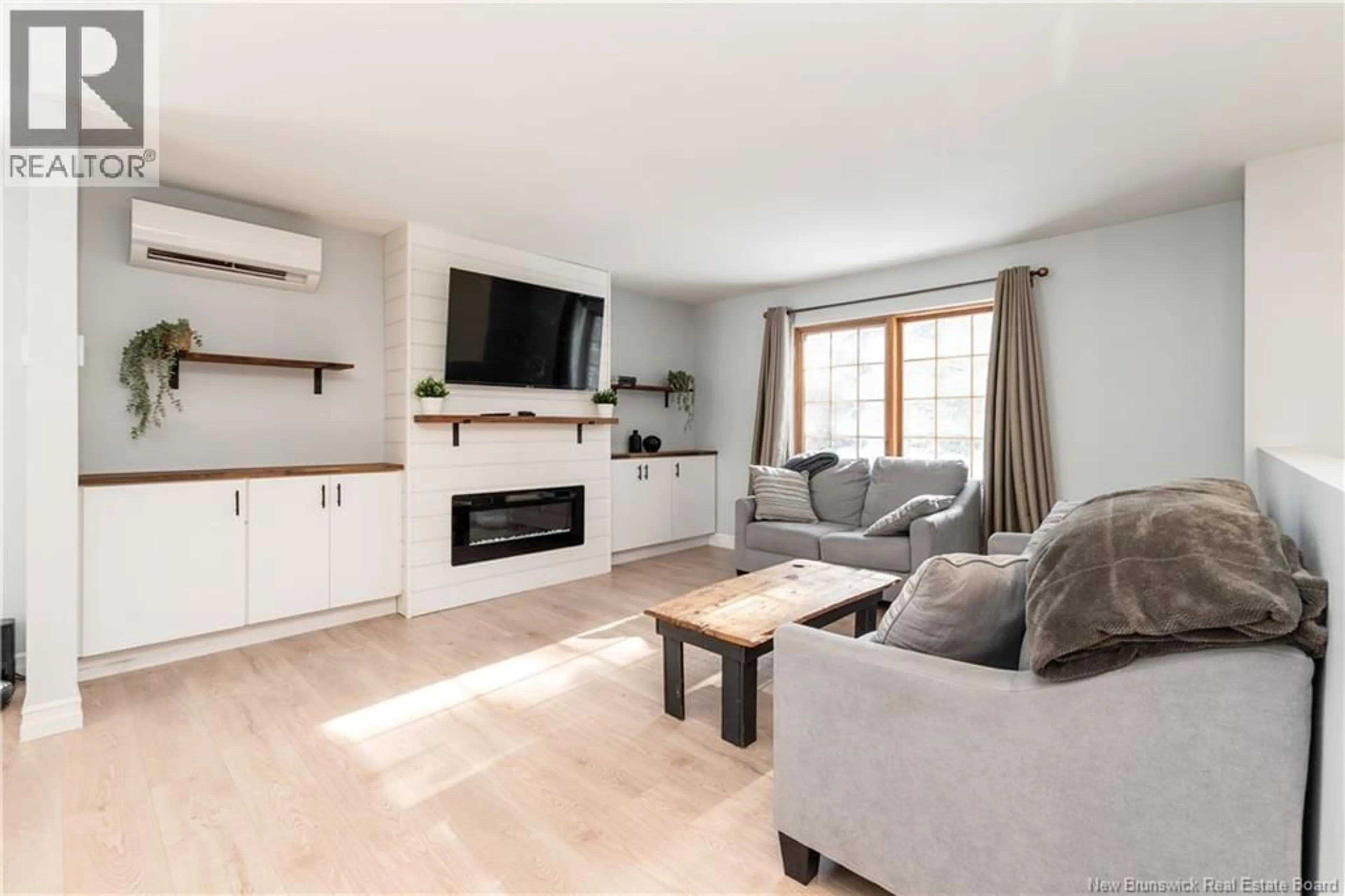 Living room with furniture, wood/laminate floor for 2283 ROUTE 112, Upper Coverdale New Brunswick E1J2A4