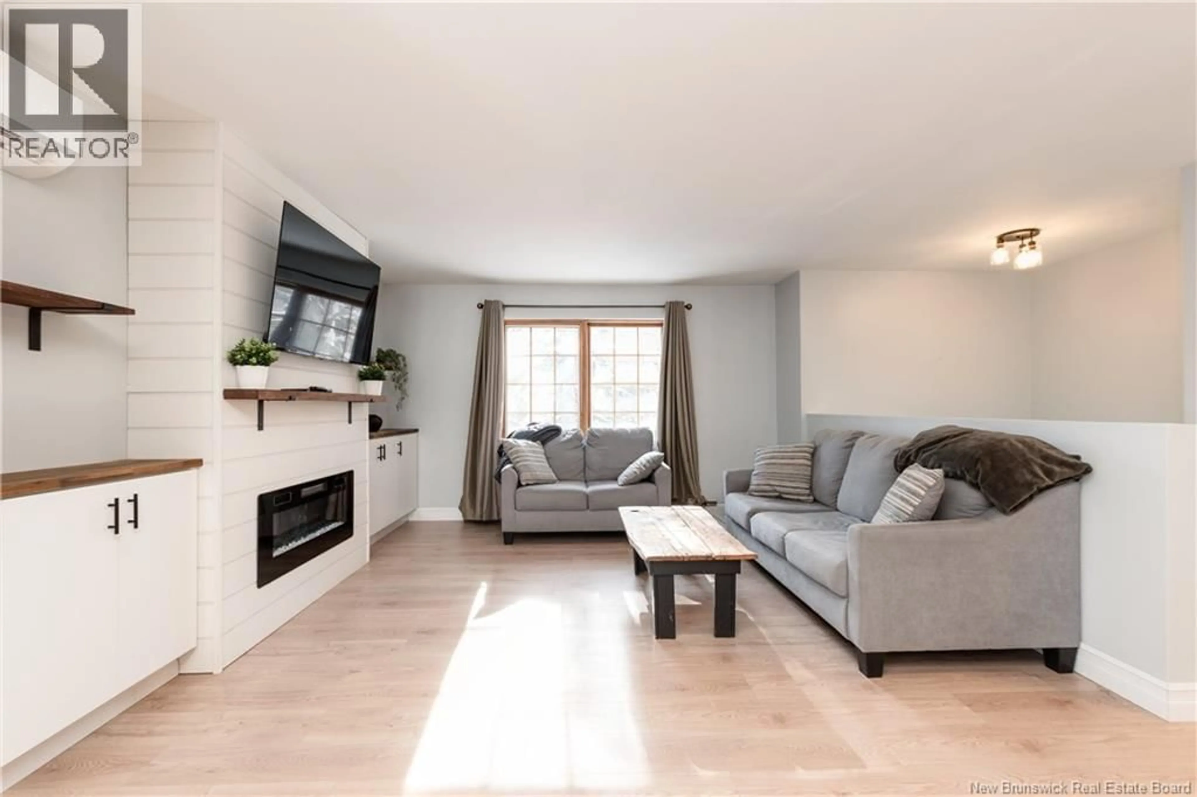 Living room with furniture, wood/laminate floor for 2283 ROUTE 112, Upper Coverdale New Brunswick E1J2A4