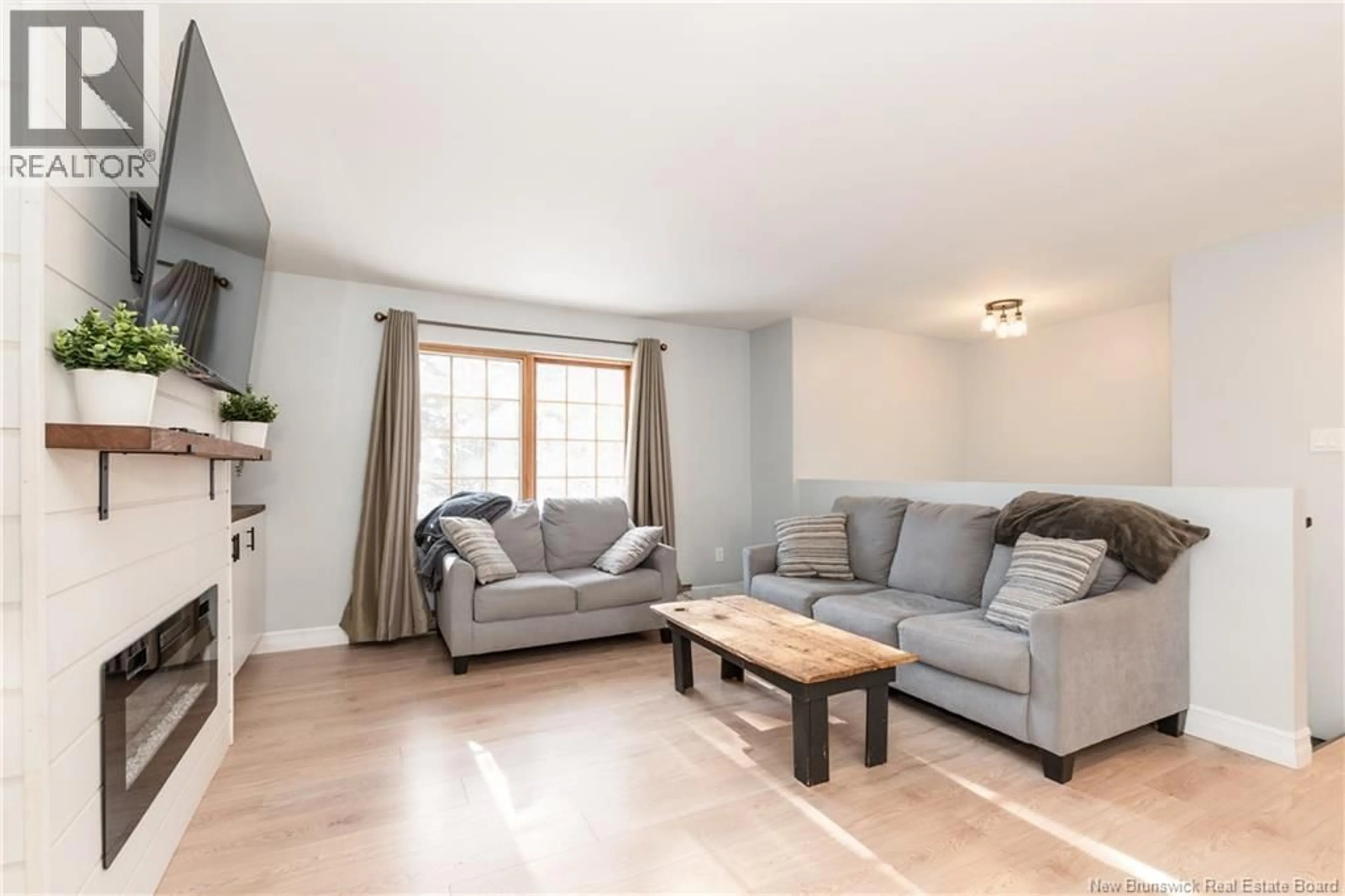 Living room with furniture, wood/laminate floor for 2283 ROUTE 112, Upper Coverdale New Brunswick E1J2A4