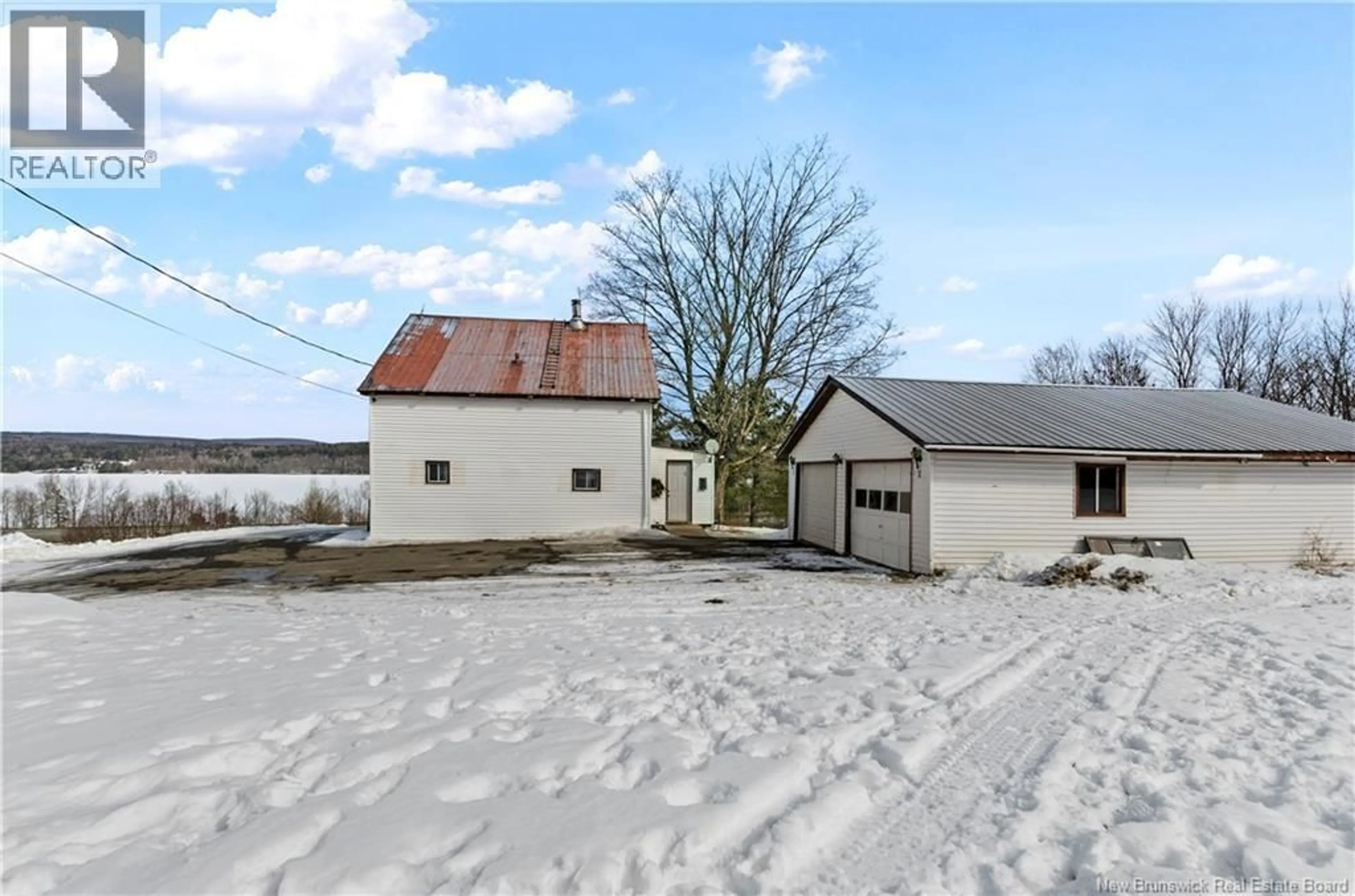 A pic from outside/outdoor area/front of a property/back of a property/a pic from drone, street for 7304 ROUTE 102, Dumfries New Brunswick E6G1P8