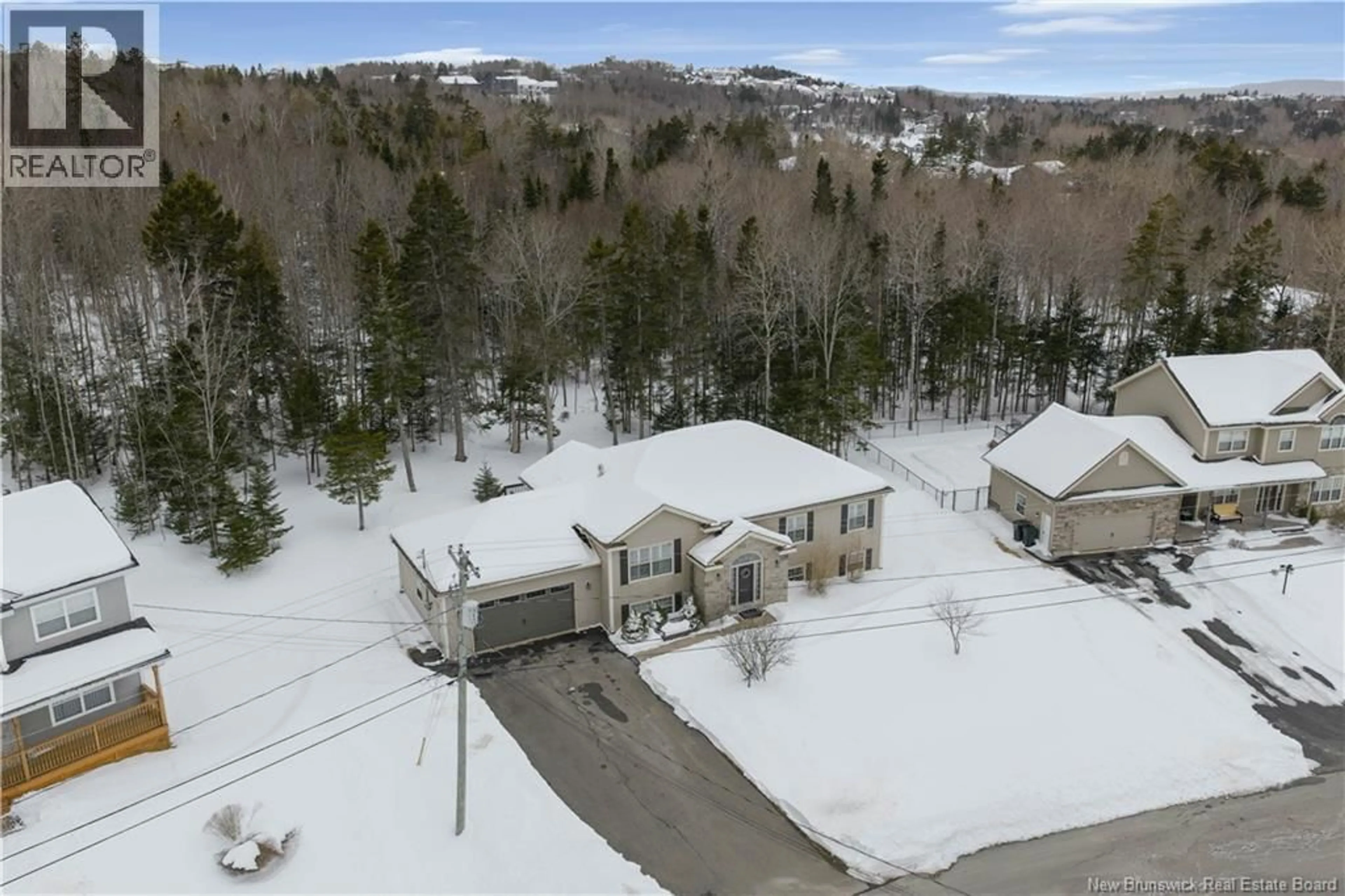 A pic from outside/outdoor area/front of a property/back of a property/a pic from drone, mountain view for 26 BLUE GRASS LANE, Quispamsis New Brunswick E2E0G7