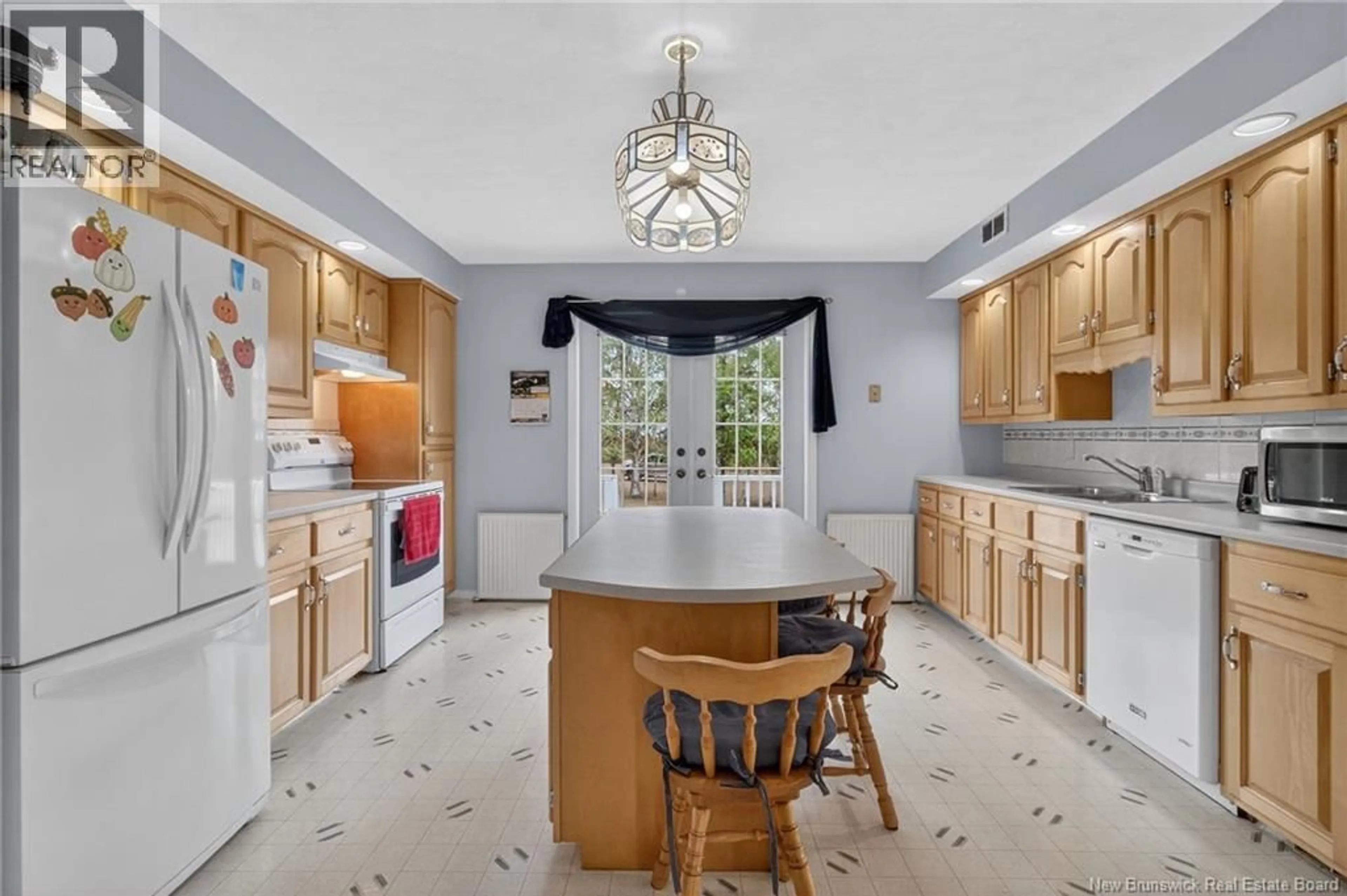 Open concept kitchen, ceramic/tile floor for 21 YOUNG STREET, Riverside-Albert New Brunswick E4H3X8