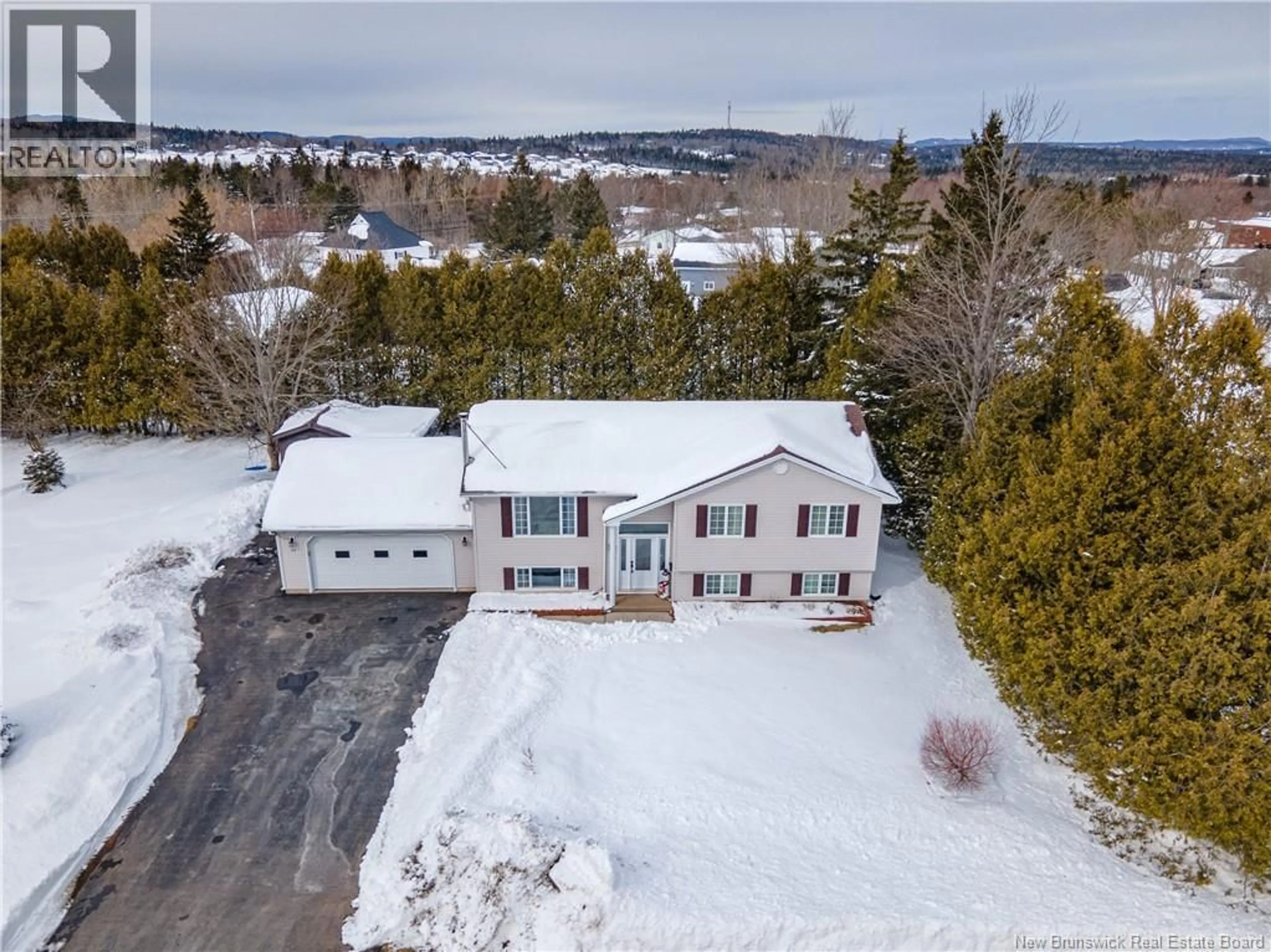 A pic from outside/outdoor area/front of a property/back of a property/a pic from drone, unknown for 11 SUNRISE DRIVE, Quispamsis New Brunswick E2E4V2