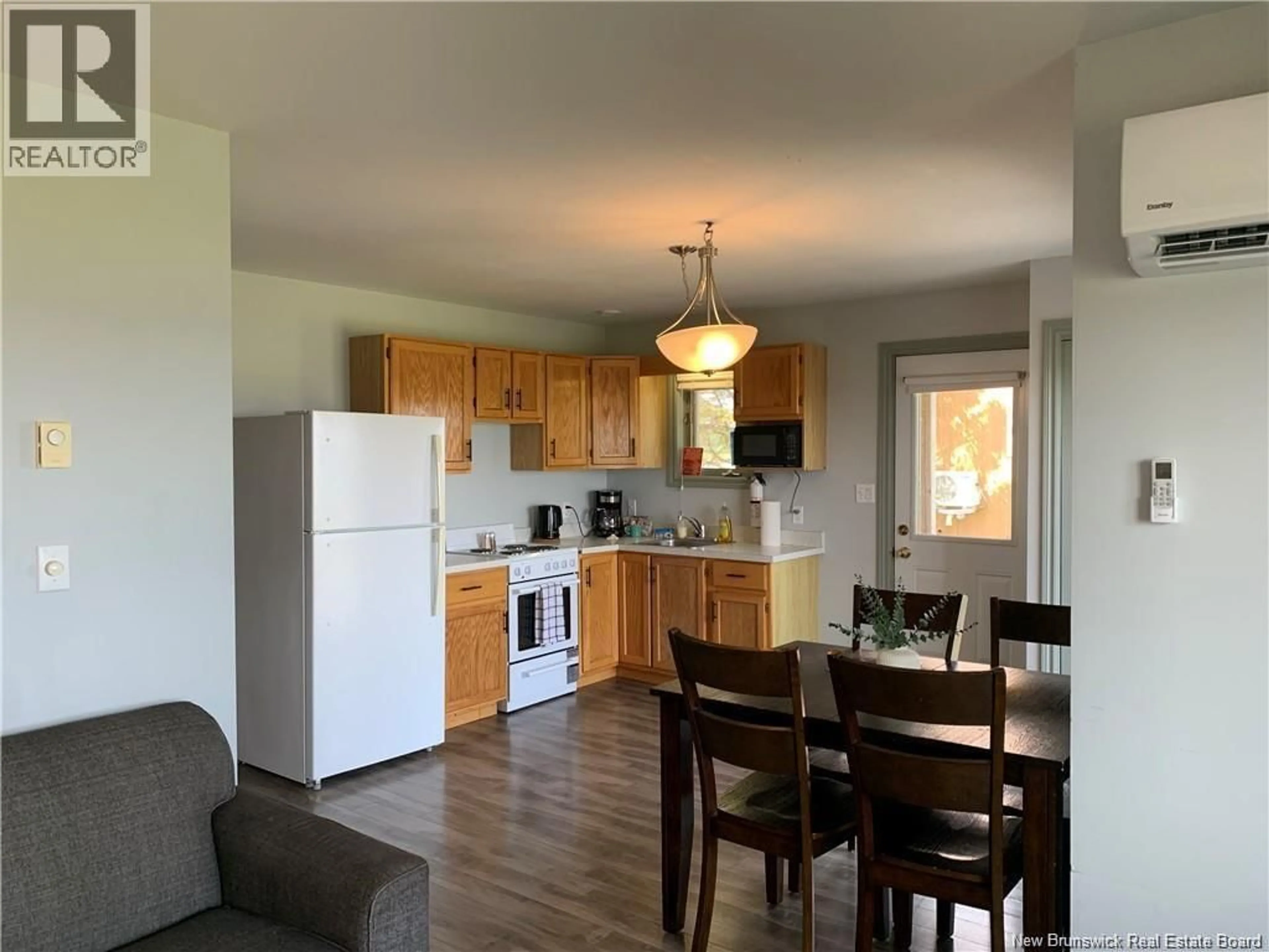 Open concept kitchen, wood/laminate floor for 120 YORK STREET, Richibucto New Brunswick E4W4K1