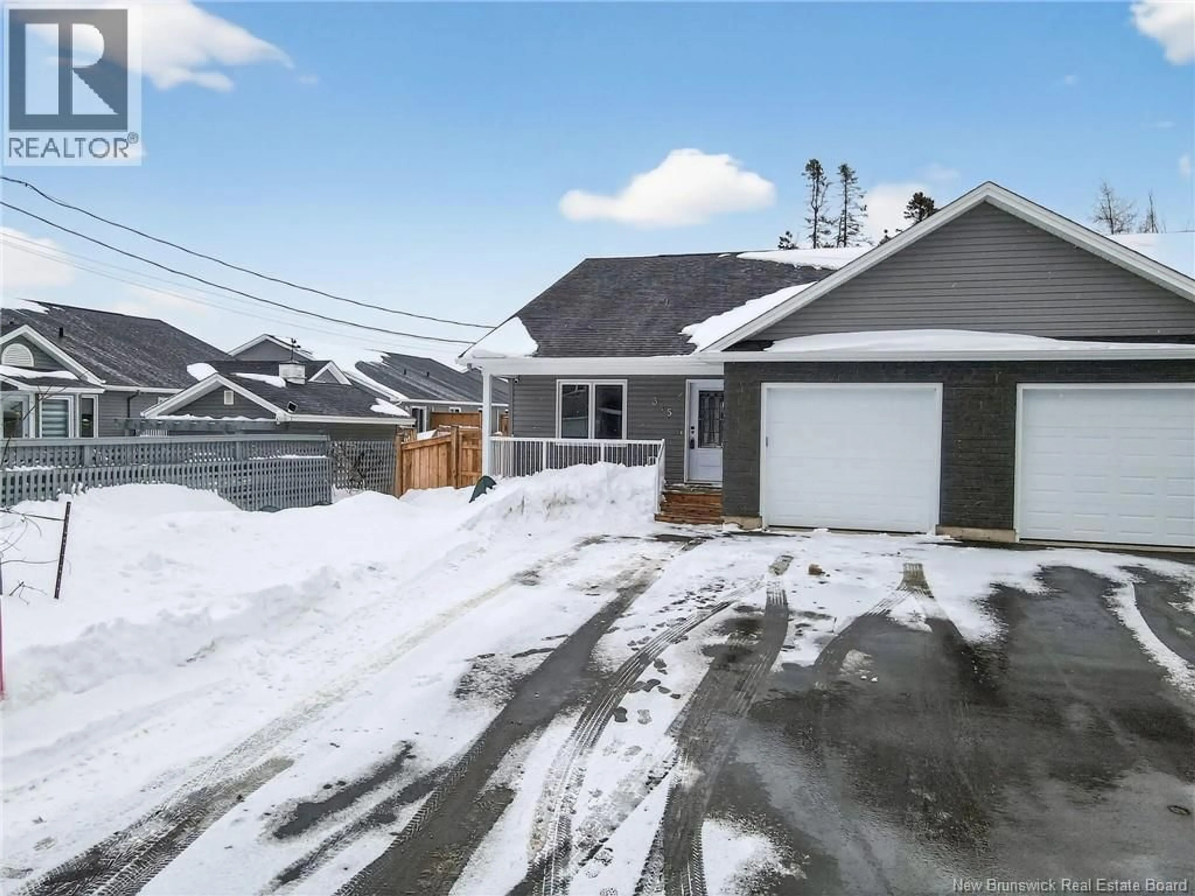 A pic from outside/outdoor area/front of a property/back of a property/a pic from drone, street for 315 TEABERRY AVENUE, Moncton New Brunswick E1G6E7