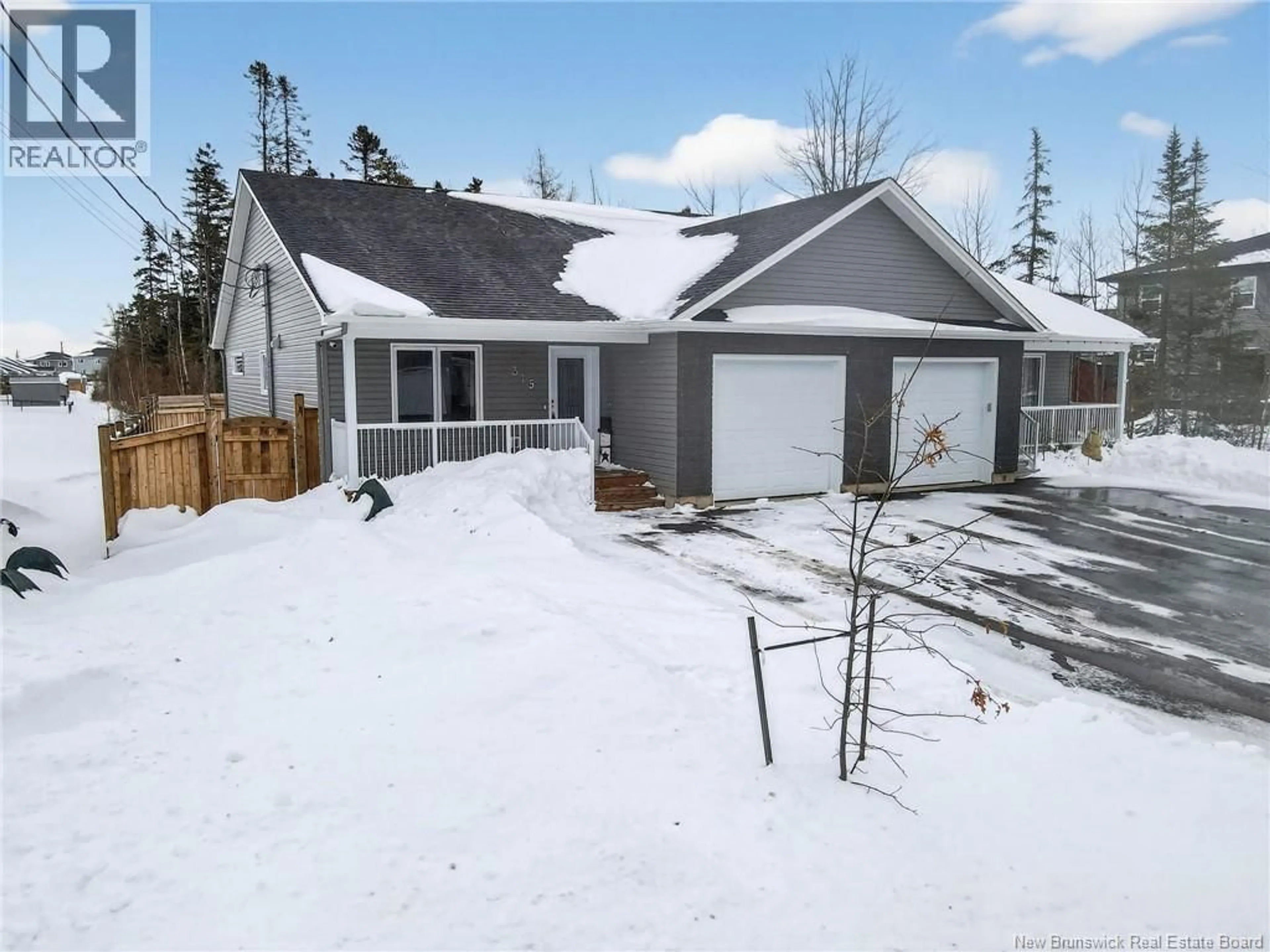 A pic from outside/outdoor area/front of a property/back of a property/a pic from drone, street for 315 TEABERRY AVENUE, Moncton New Brunswick E1G6E7