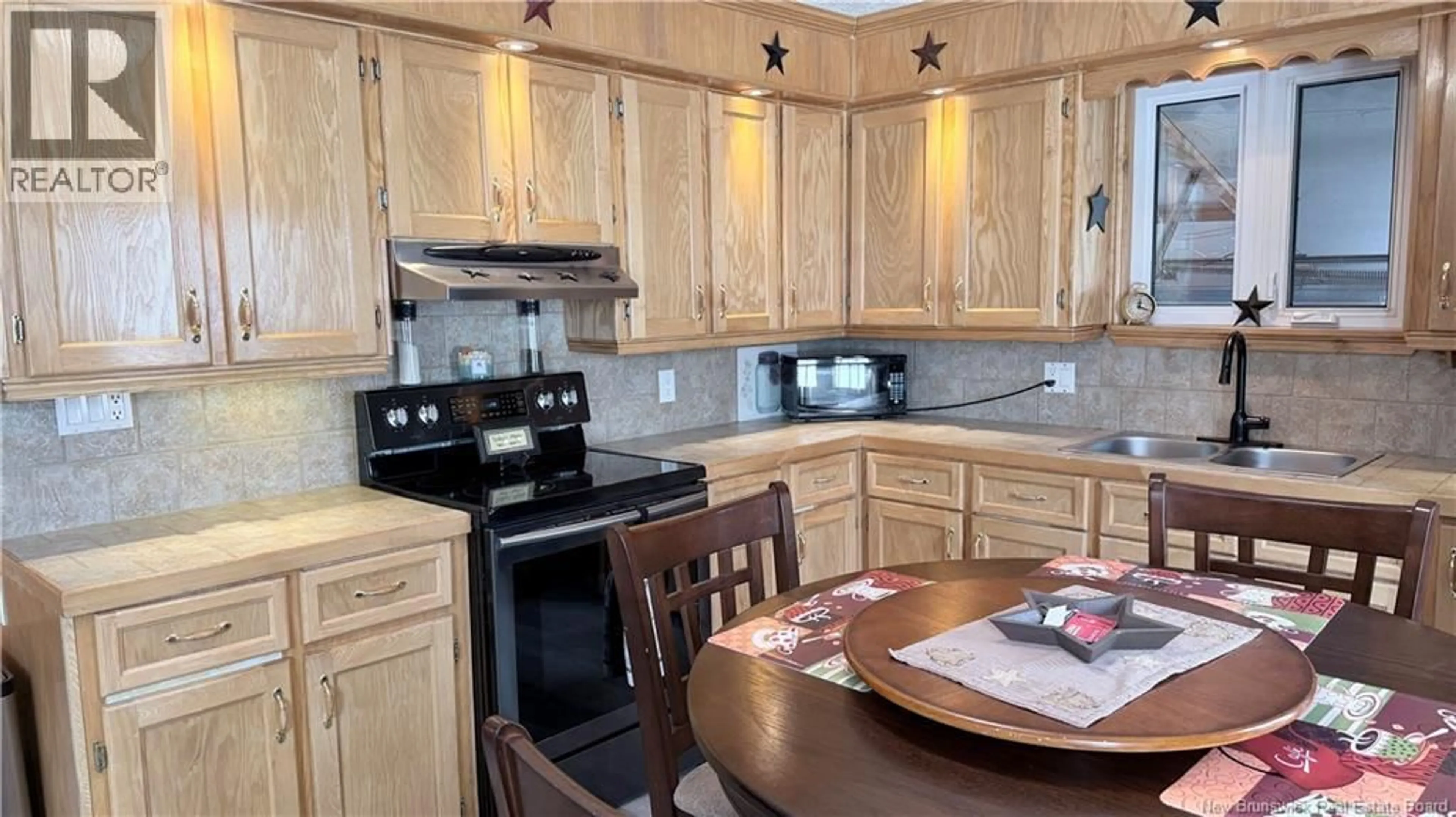 Standard kitchen, wood/laminate floor for 3 RUE THERIAULT, Rivière-Verte New Brunswick E7C2W6