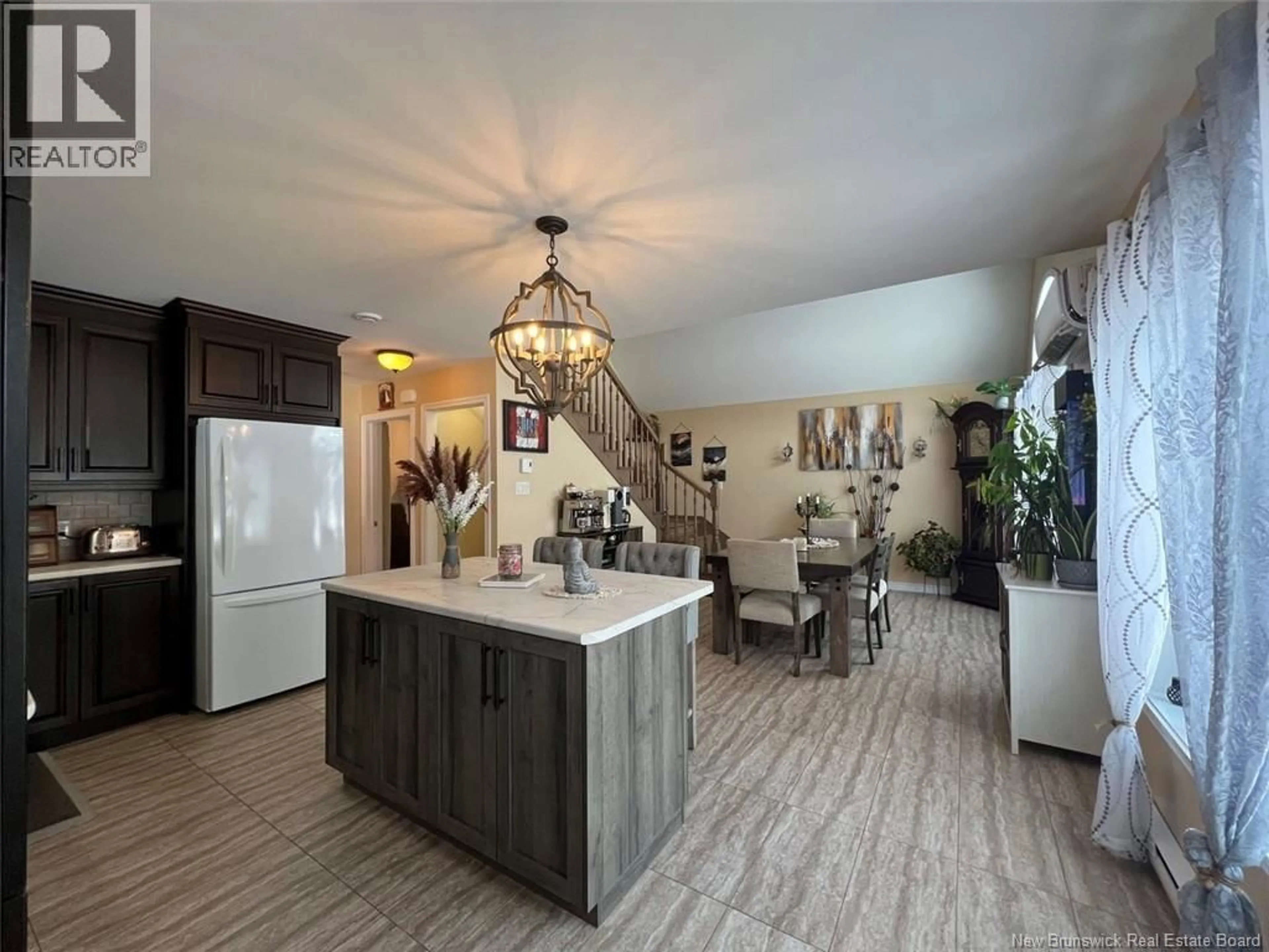 Open concept kitchen, ceramic/tile floor for 18 COUTURIER, Rivière-Verte New Brunswick E7C3G1