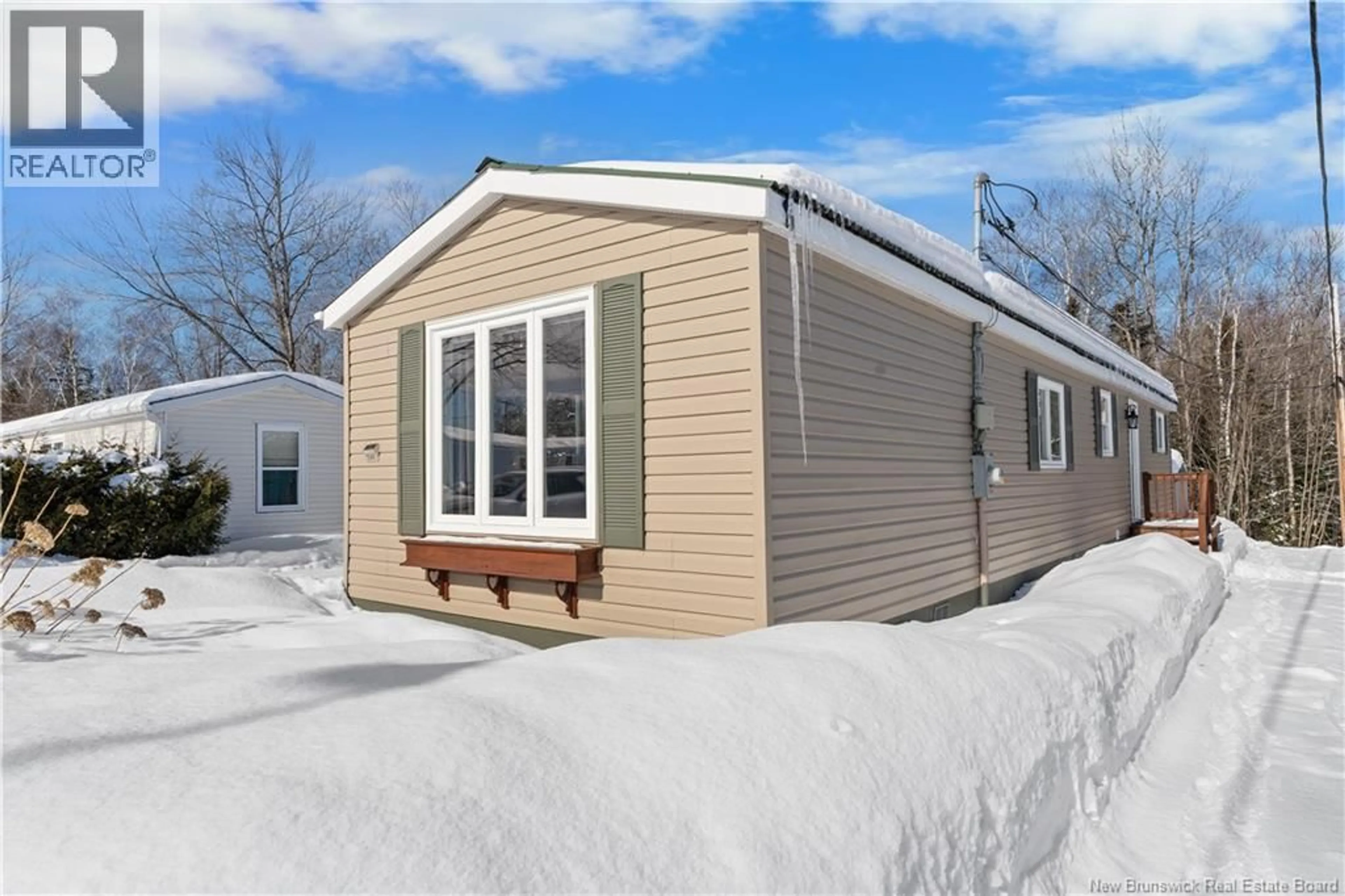 Home with vinyl exterior material, street for 240 BIRCHGROVE, Beresford New Brunswick E8K1G7