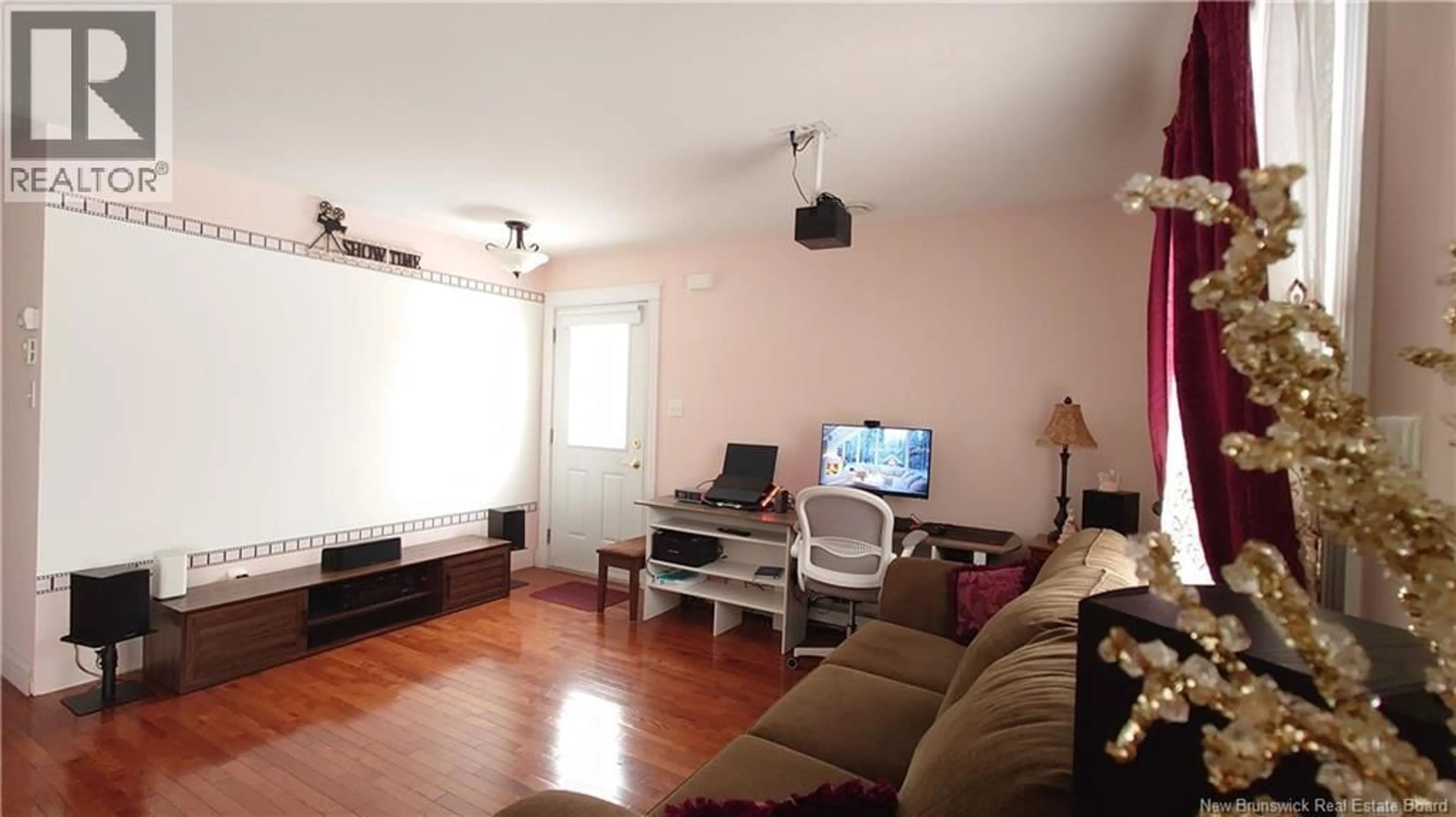 Living room with furniture, wood/laminate floor for 50 SEQUOIA DRIVE, Moncton New Brunswick E1E0A2