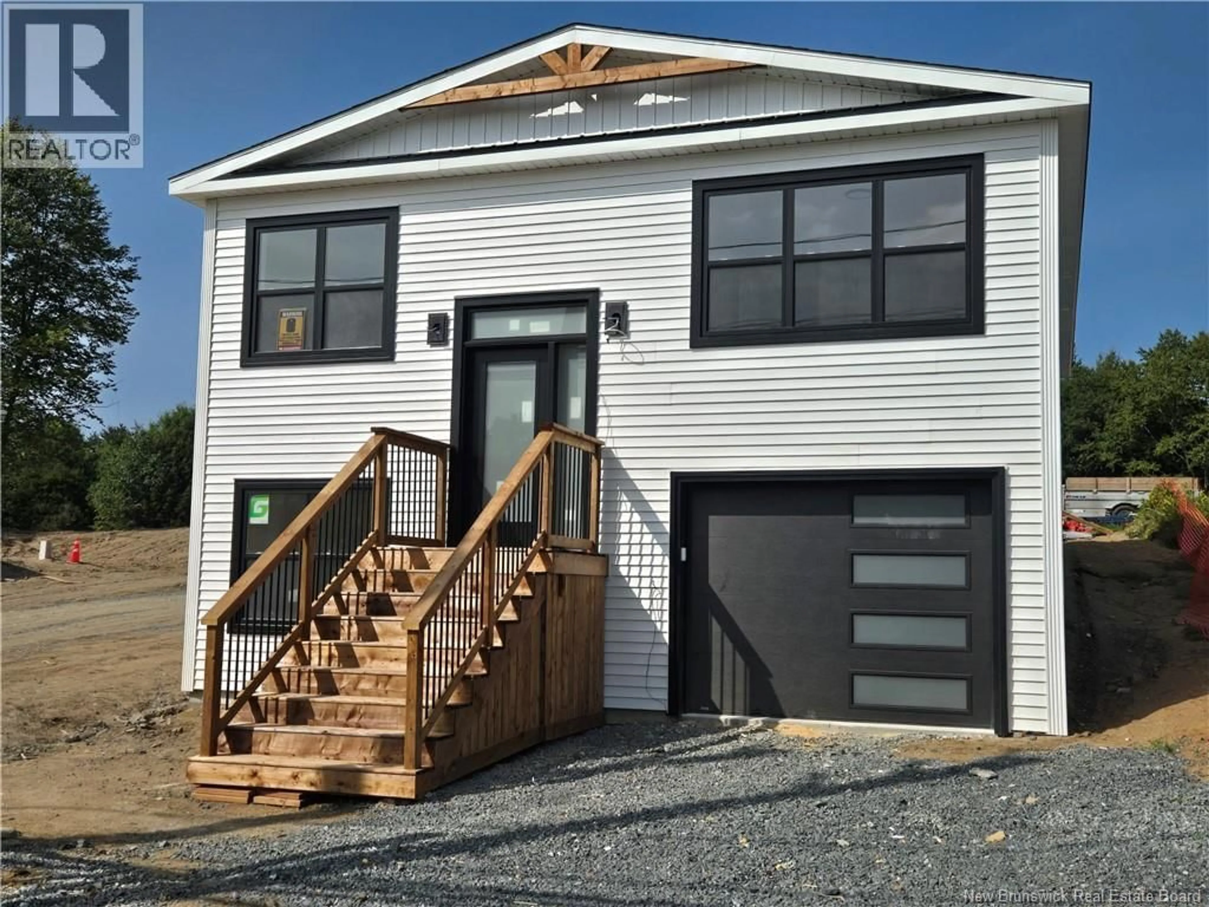 Home with vinyl exterior material, street for 509 GIBSON STREET, Fredericton New Brunswick E3A4E8