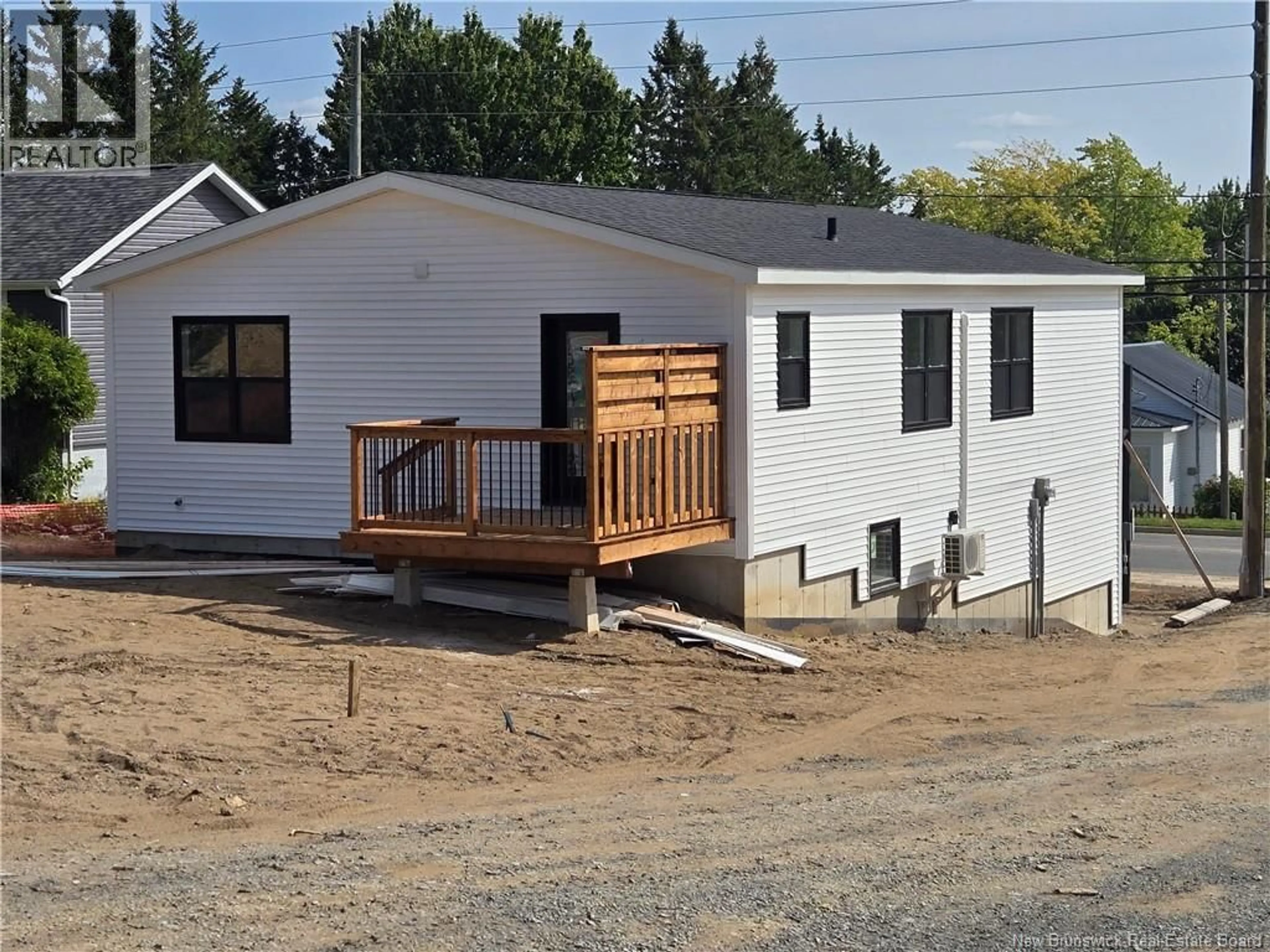 Home with vinyl exterior material, street for 509 GIBSON STREET, Fredericton New Brunswick E3A4E8