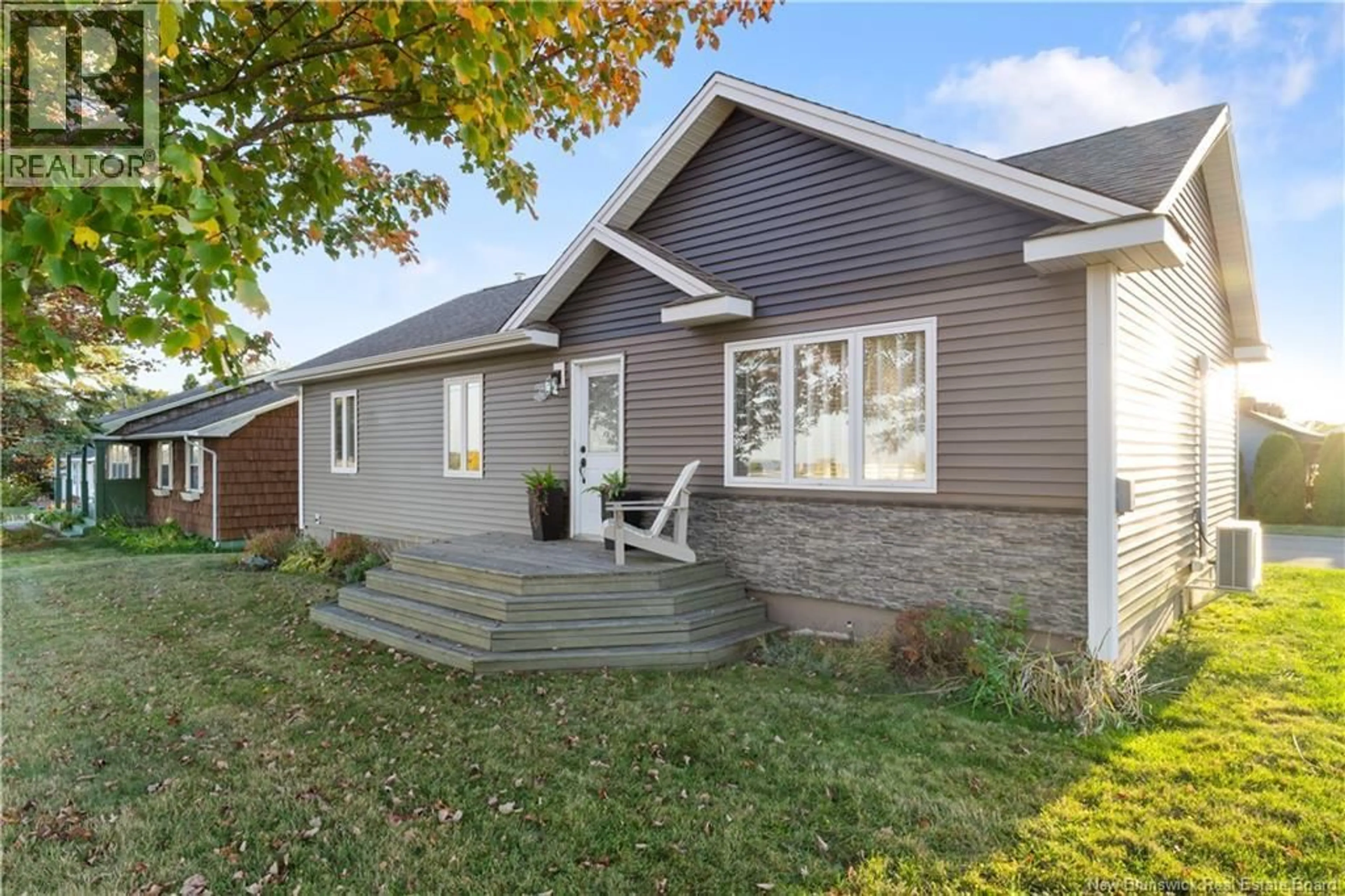 Home with vinyl exterior material, street for 42 DU PARC ROAD, Bouctouche New Brunswick E4S3C5