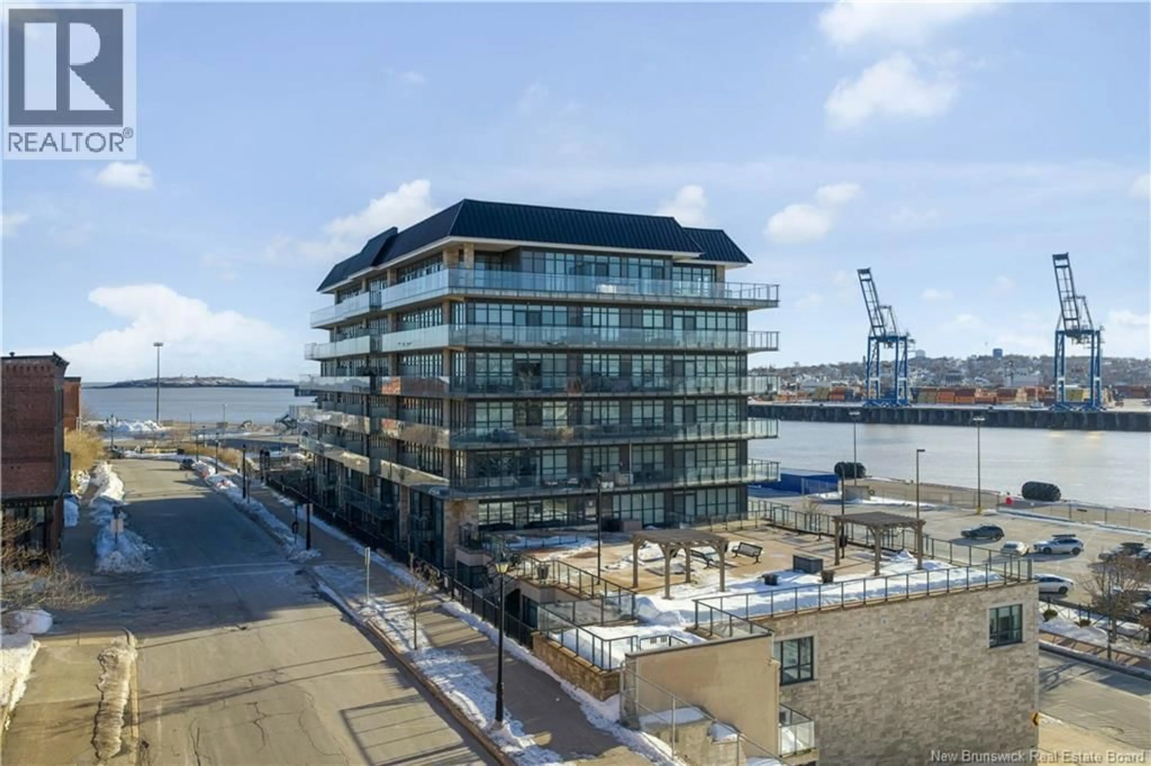 A pic from outside/outdoor area/front of a property/back of a property/a pic from drone, water/lake/river/ocean view for 111 - 243 PRINCE WILLIAM STREET, Saint John New Brunswick E2L0C6