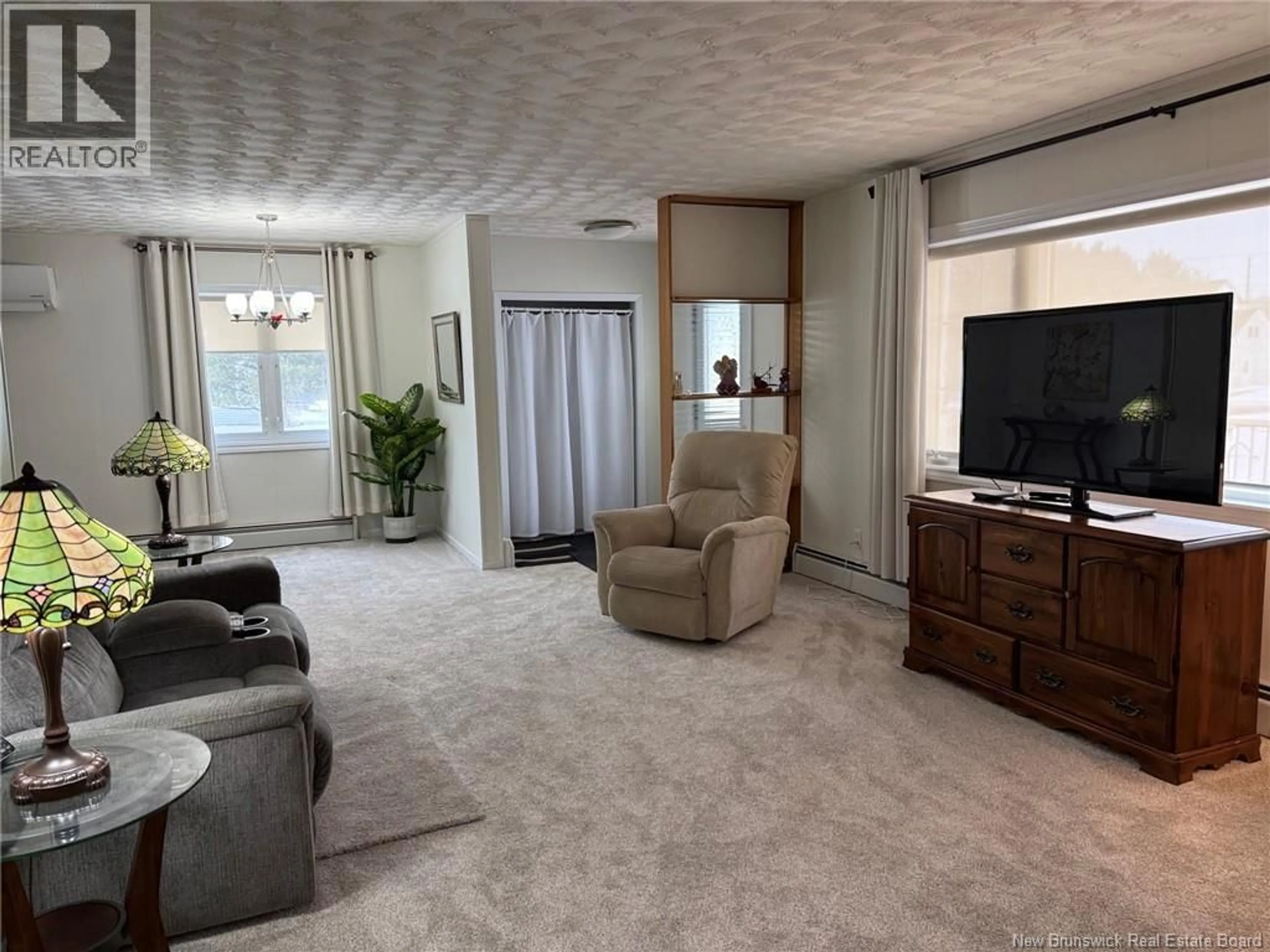 Living room with furniture, unknown for 60 MCINTOSH STREET, Miramichi New Brunswick E1N2B3