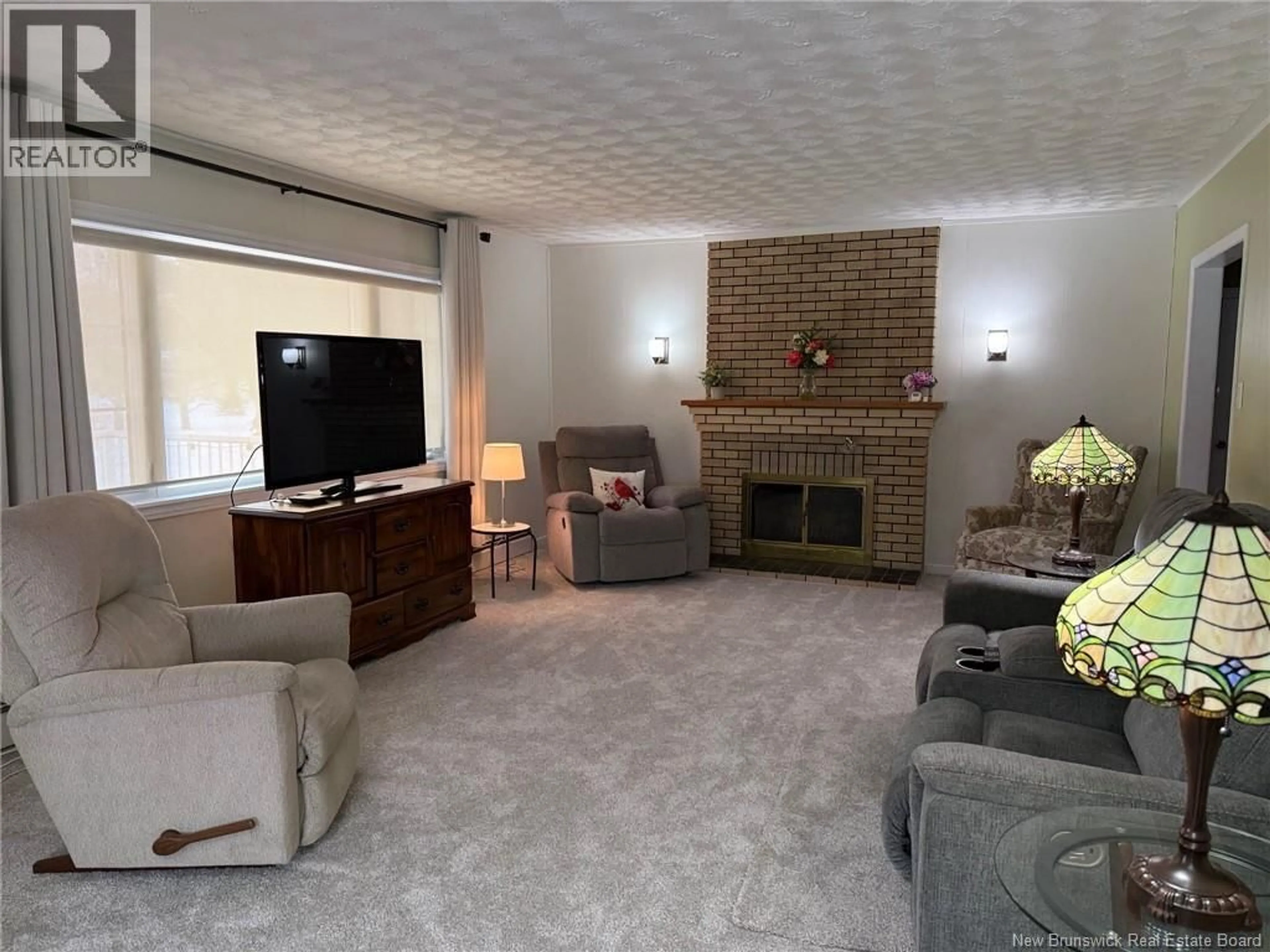 Living room with furniture, unknown for 60 MCINTOSH STREET, Miramichi New Brunswick E1N2B3