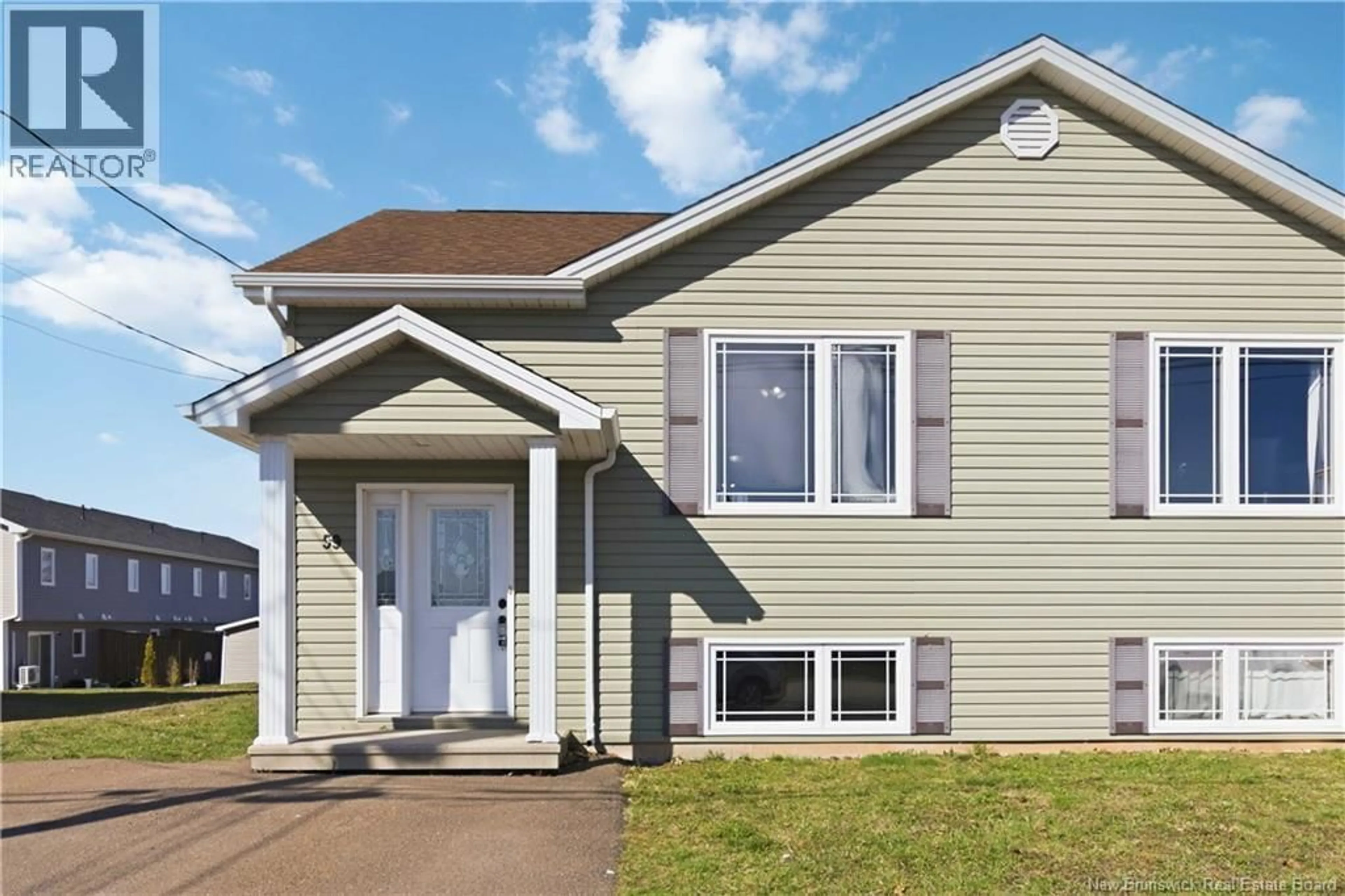 Home with vinyl exterior material, street for 59 JEANNETTE, Dieppe New Brunswick E1A0G6
