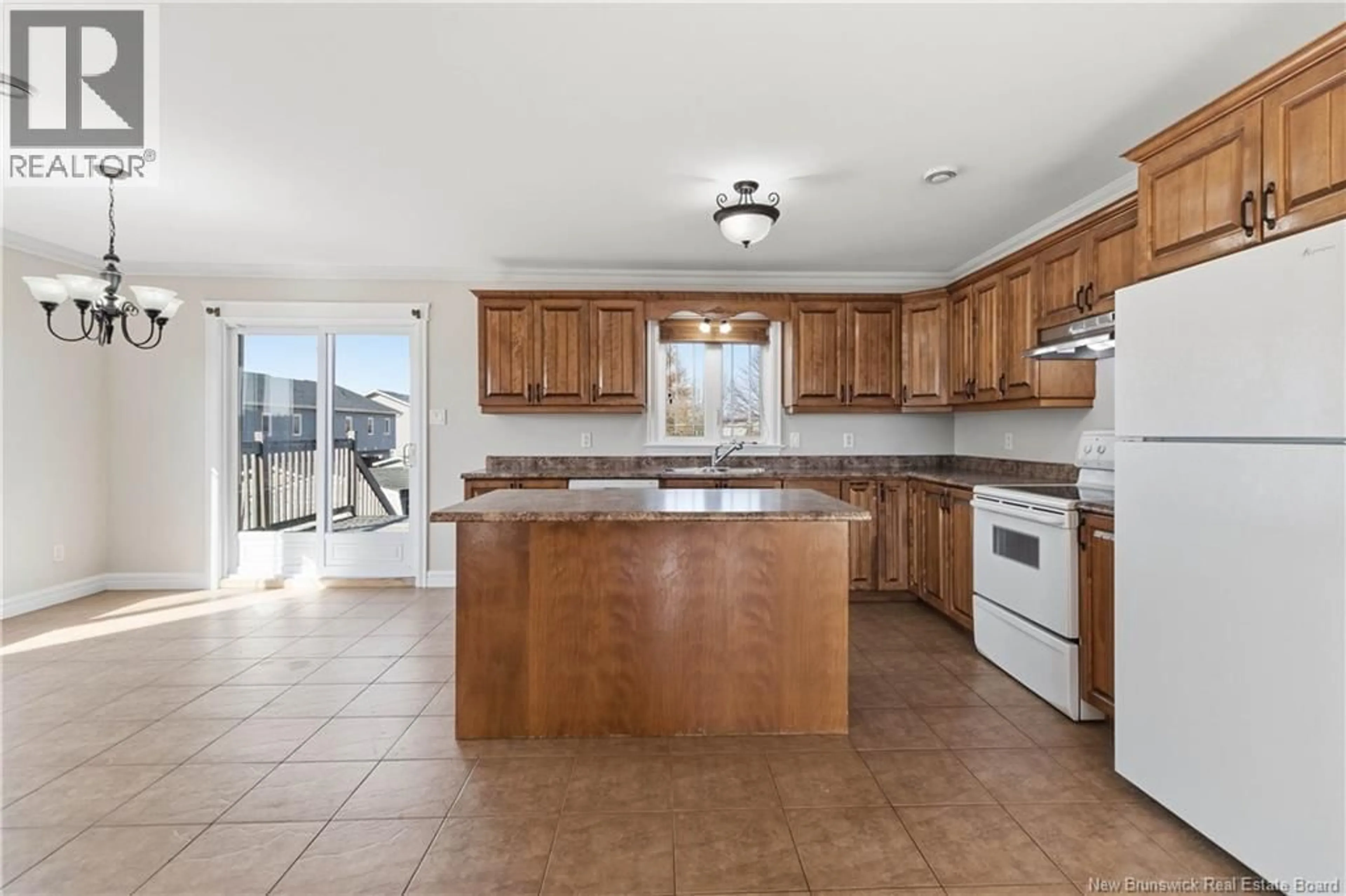 Open concept kitchen, ceramic/tile floor for 59 JEANNETTE, Dieppe New Brunswick E1A0G6
