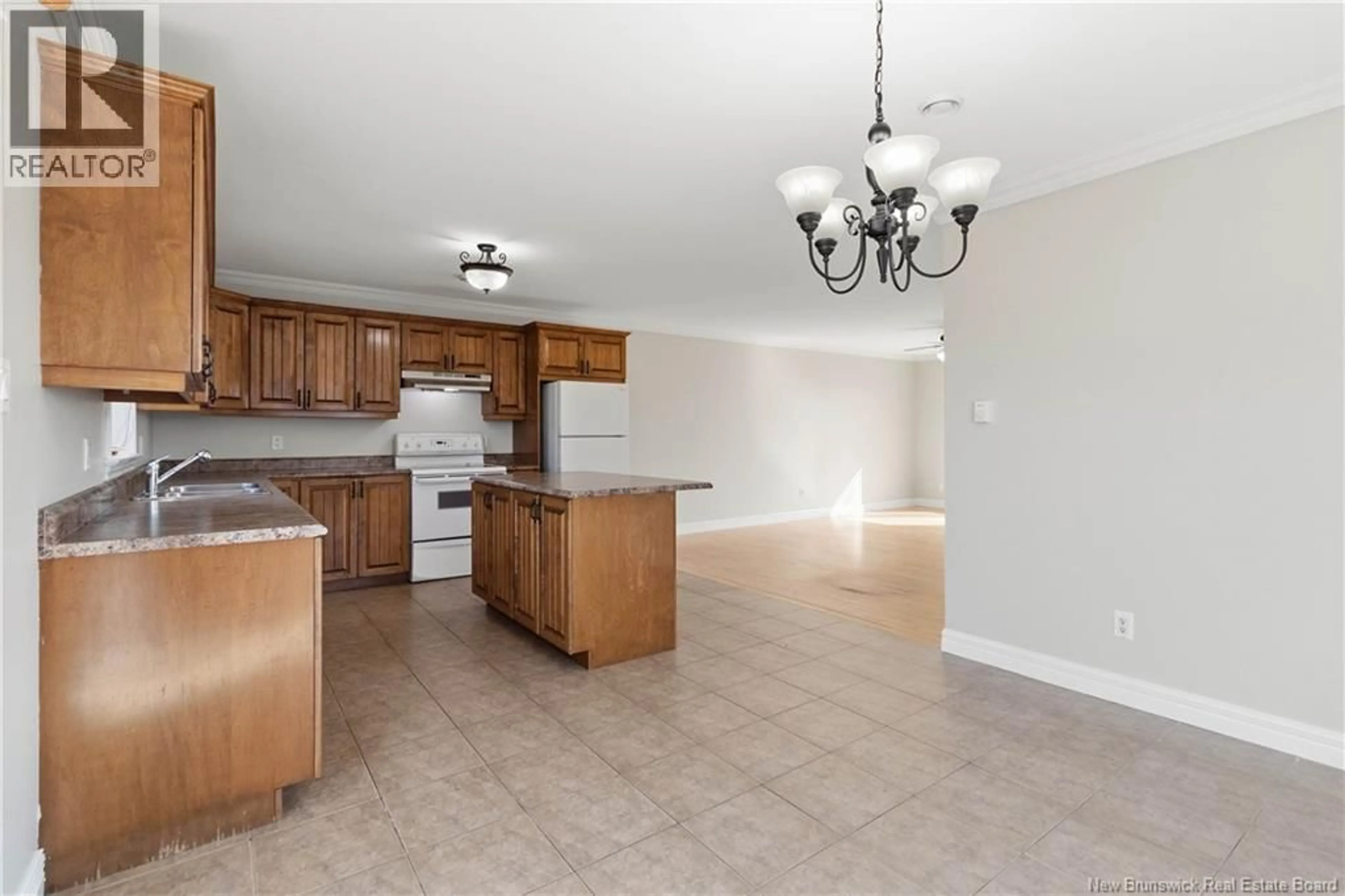 Open concept kitchen, ceramic/tile floor for 59 JEANNETTE, Dieppe New Brunswick E1A0G6