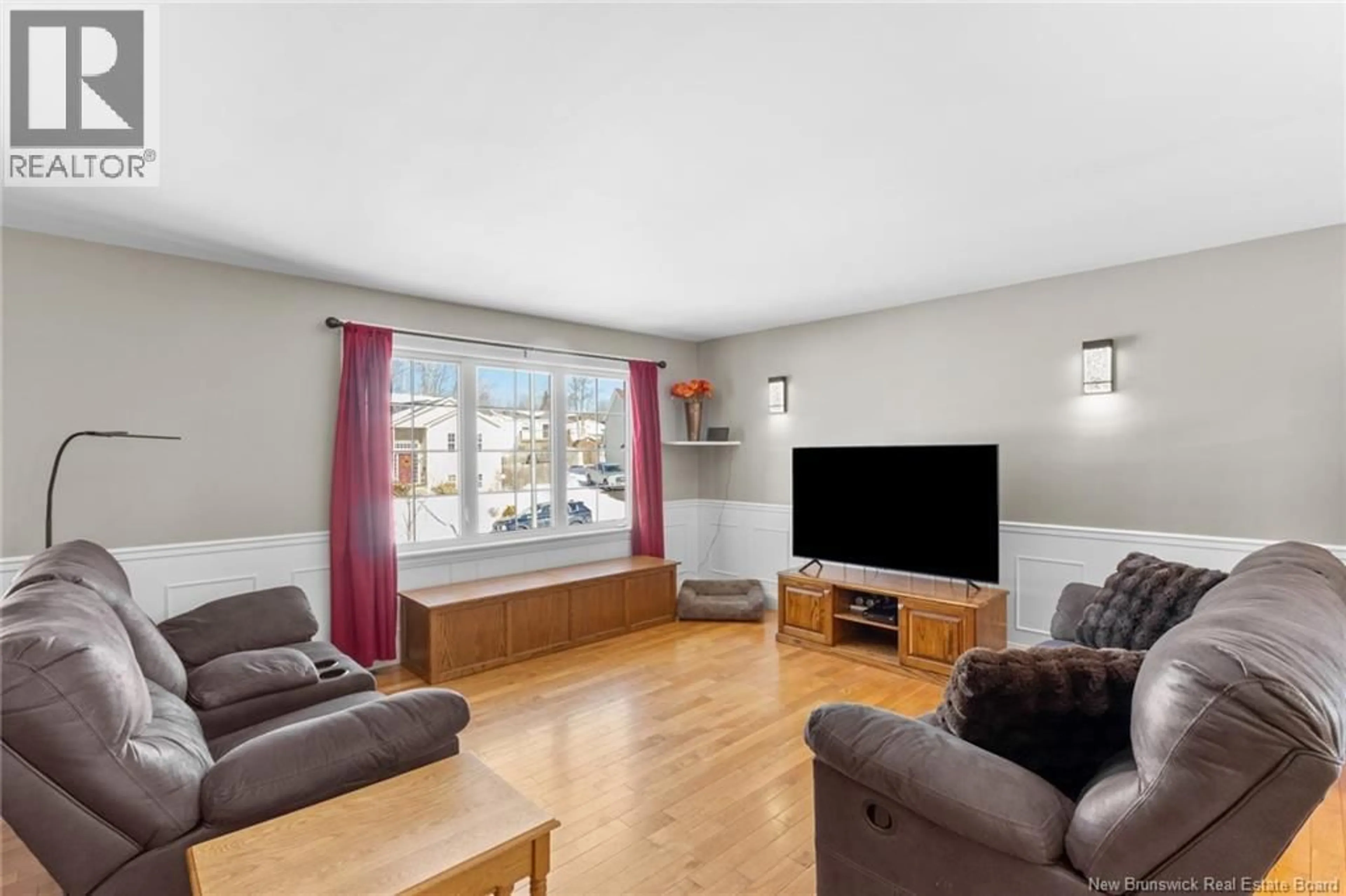 Living room with furniture, wood/laminate floor for 2 HARRIS STREET, Oromocto New Brunswick E2V0A9